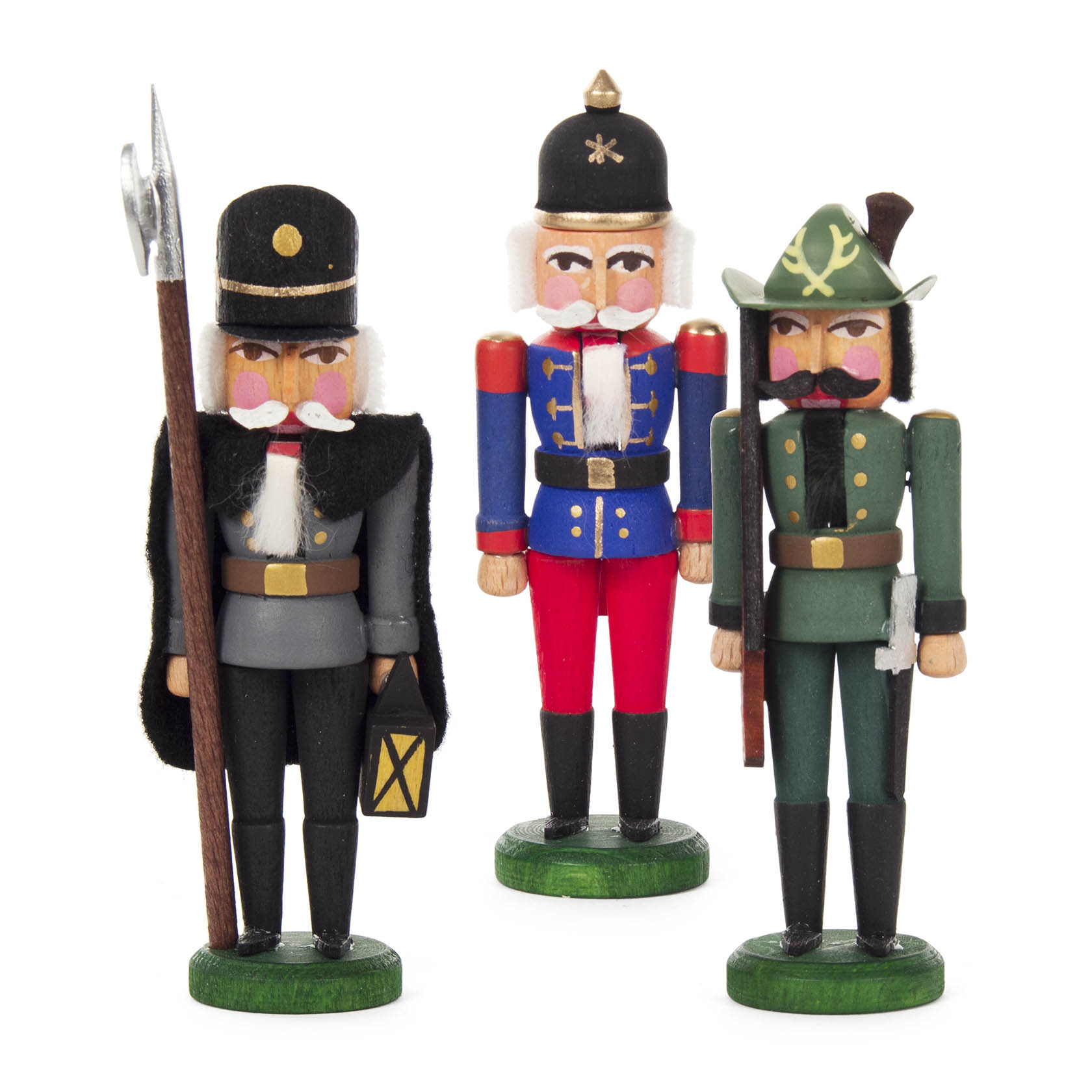 Drei Mini-Nussknacker in Form von preußischen Schutzmännern, jeweils unterschiedlich gekleidet. Einer hält eine Laterne, ein anderer eine Hellebarde. im Dregeno Online Shop günstig kaufen