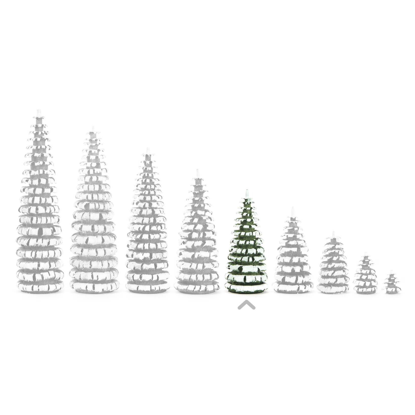 A lineup of spiral trees in varying sizes, with the fifth tree from the left being green and white, standing out among the predominantly white trees.