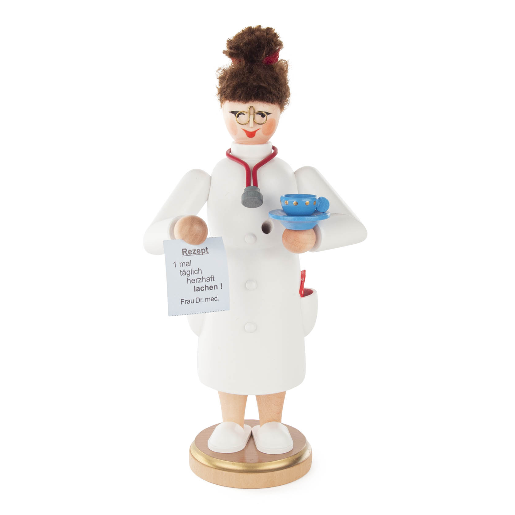 Räucherfigur einer Ärztin mit brünettem Haar, die einen weißen Kittel und eine Brille trägt. Sie hält eine Rezeptkarte und ein blaues Räuchergefäß. im Dregeno Online Shop günstig kaufen