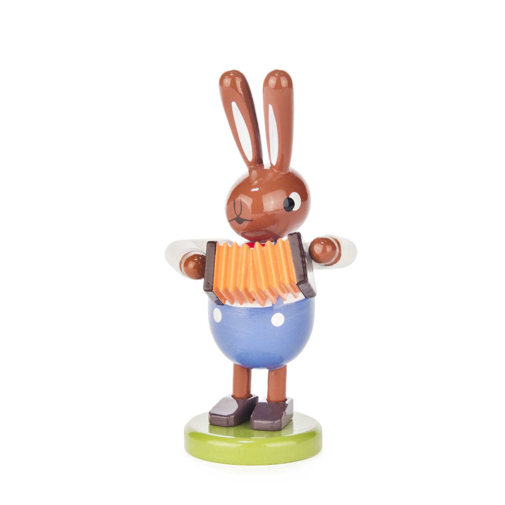 Holzfigur eines Hasen in blauem Outfit, der eine orangefarbene Ziehharmonika hält. im Dregeno Online Shop günstig kaufen