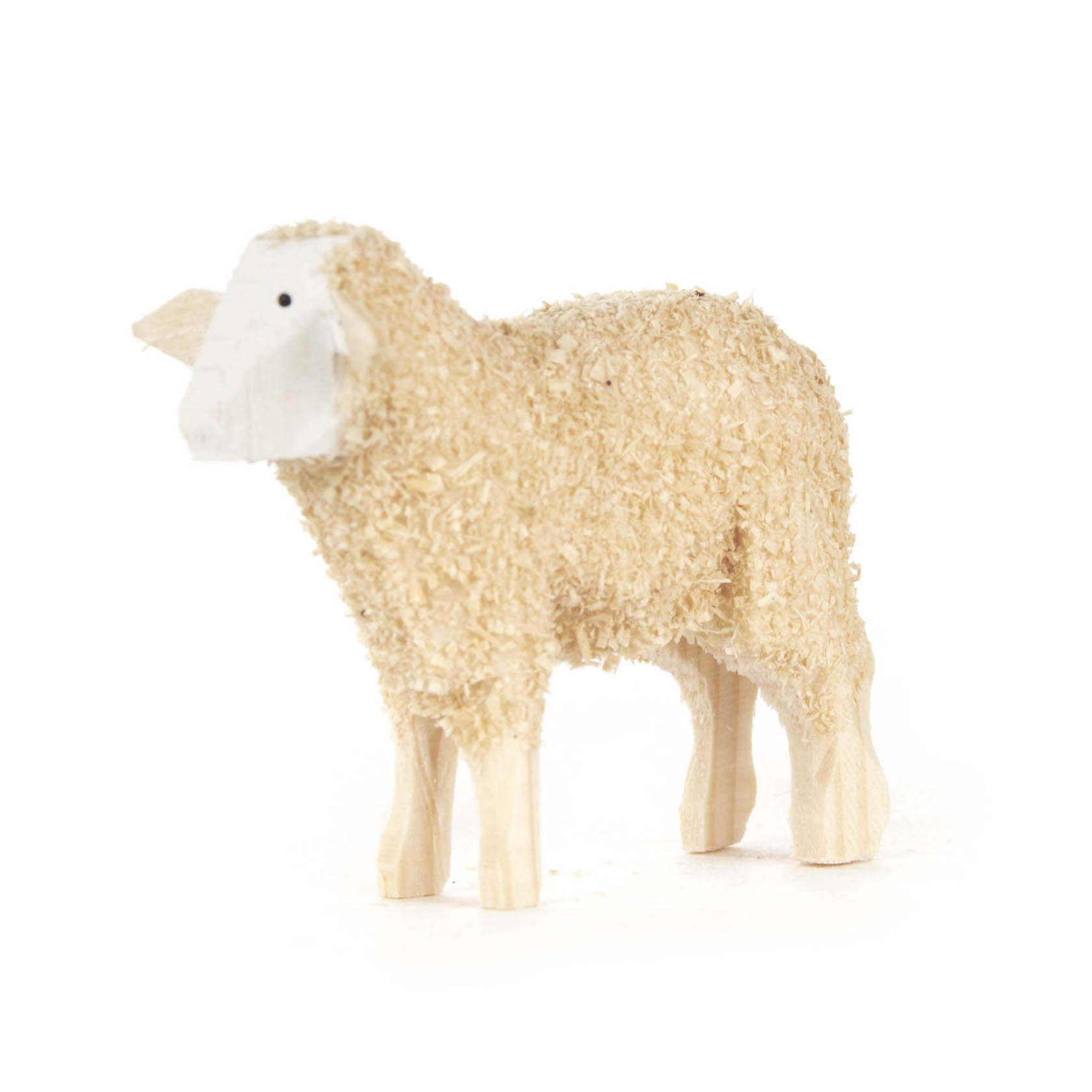 Ein kleines hölzernes Schaf mit gekräuselter Oberfläche und weißen Gesicht steht auf vier Beinen. Es wirkt rustikal und handgefertigt. im Dregeno Online Shop günstig kaufen
