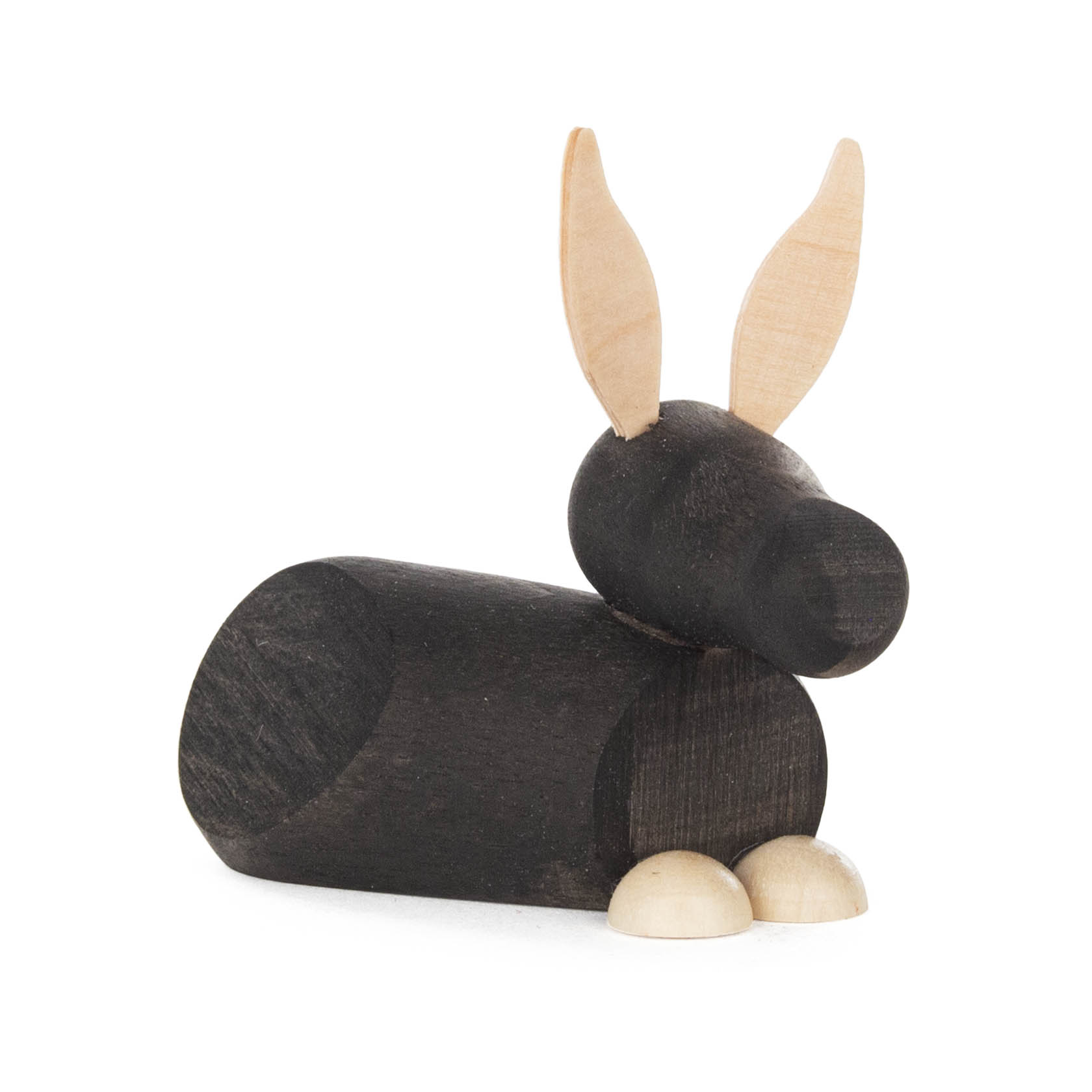Eine kleine, moderne Eselskulptur in liegender Position mit naturfarbenen Ohren und Füßen, gefertigt aus anthrazitfarbenem Holz. im Dregeno Online Shop günstig kaufen