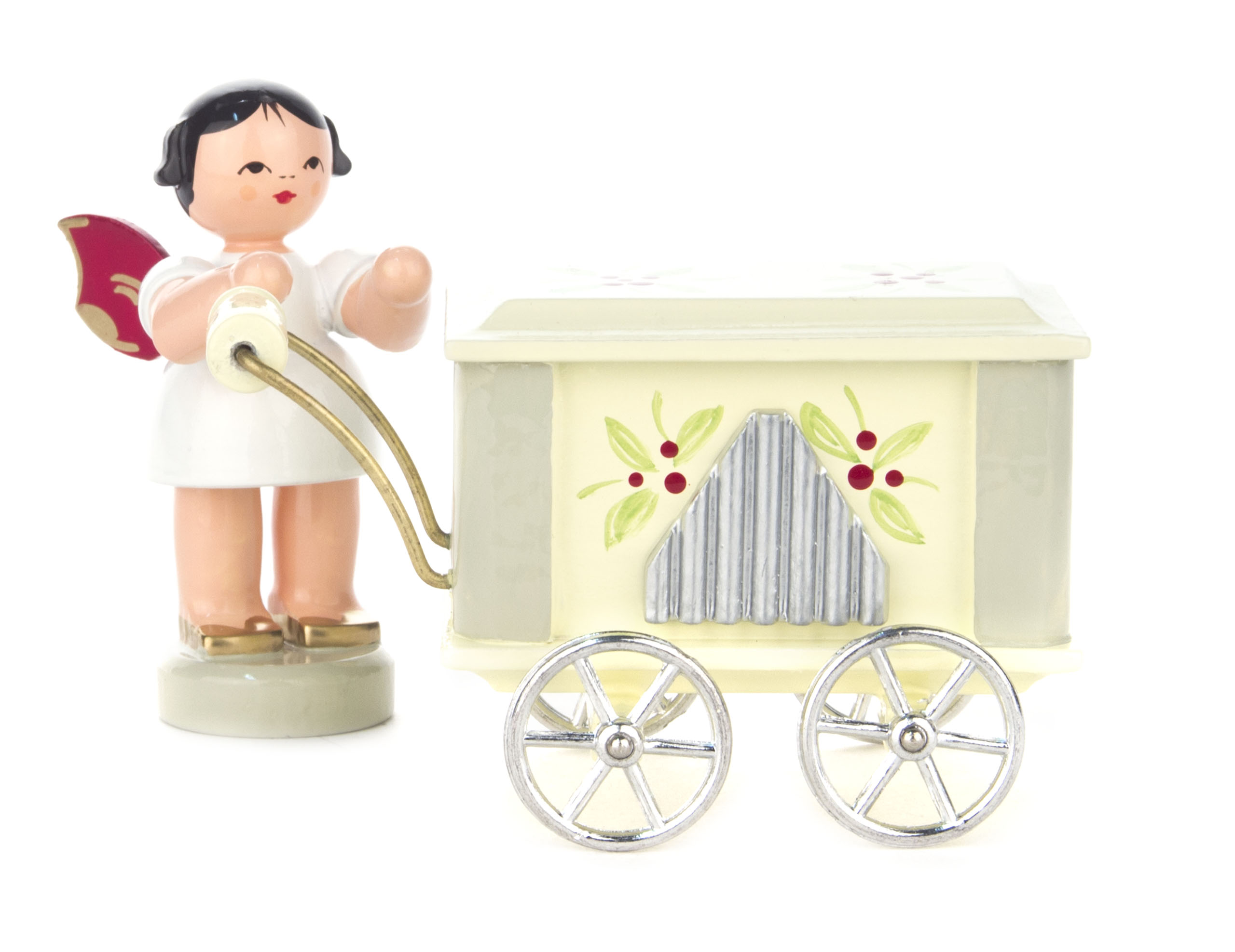Figur eines Engels mit schwarzen Haaren und roten Flügeln, der an einer kleinen Drehorgel aus weißem und grauem Porzellan steht. im Dregeno Online Shop günstig kaufen