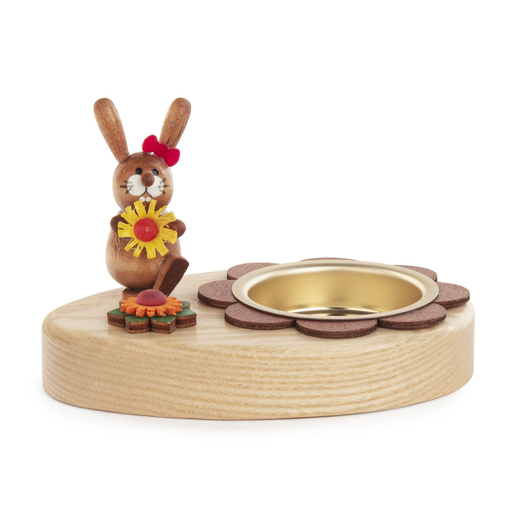 Ein hölzerner Teelichthalter in Form einer Blume, verziert mit einem Hasen, der eine Sonnenblume hält. im Dregeno Online Shop günstig kaufen