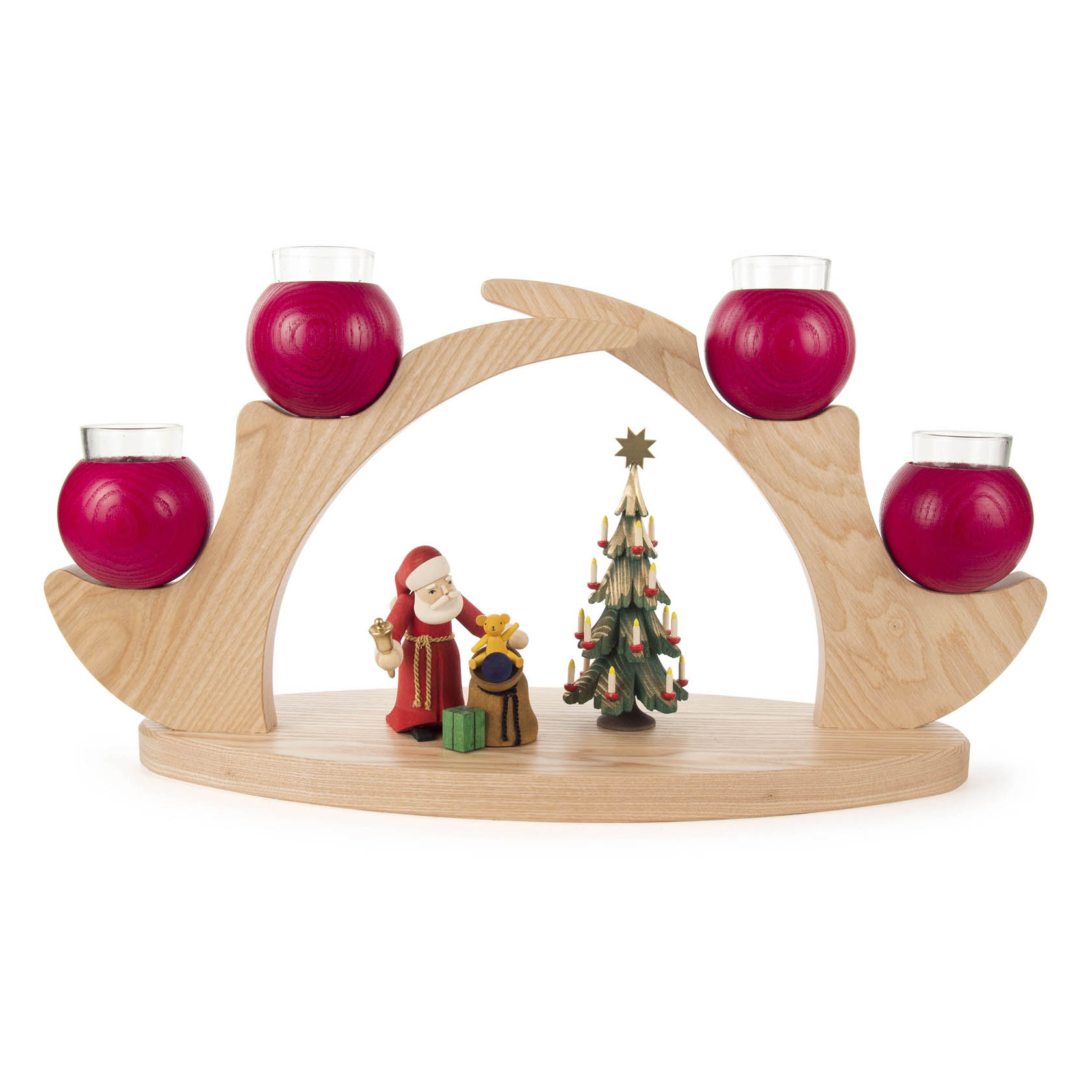 A wooden candle holder with four red ball-shaped candle slots. Below, a Santa figure and a decorated Christmas tree are displayed.