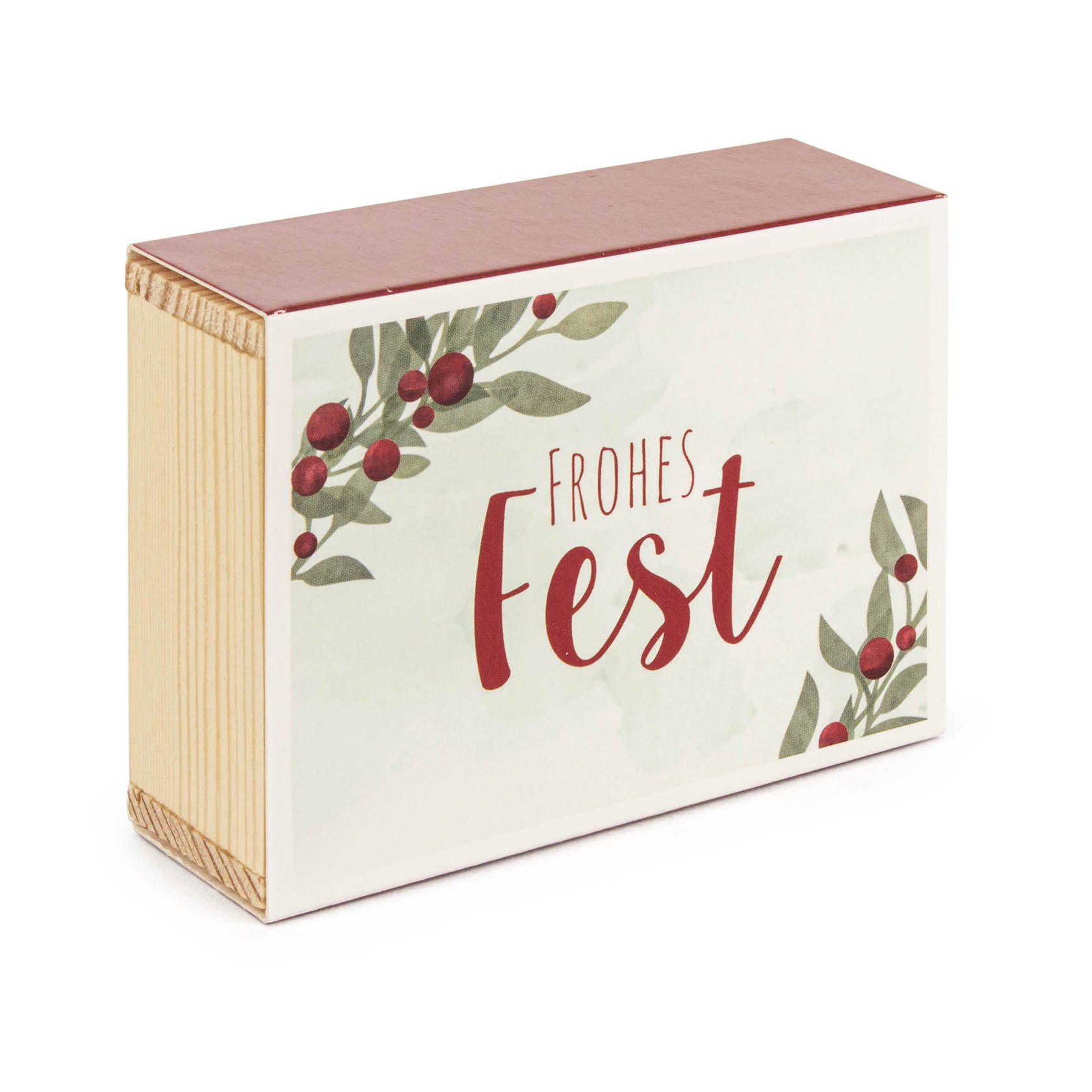 Ein rechteckiges Holzkästchen mit der Aufschrift 'Frohes Fest' in roter Schrift und grünen Blättern mit roten Beeren verziert.