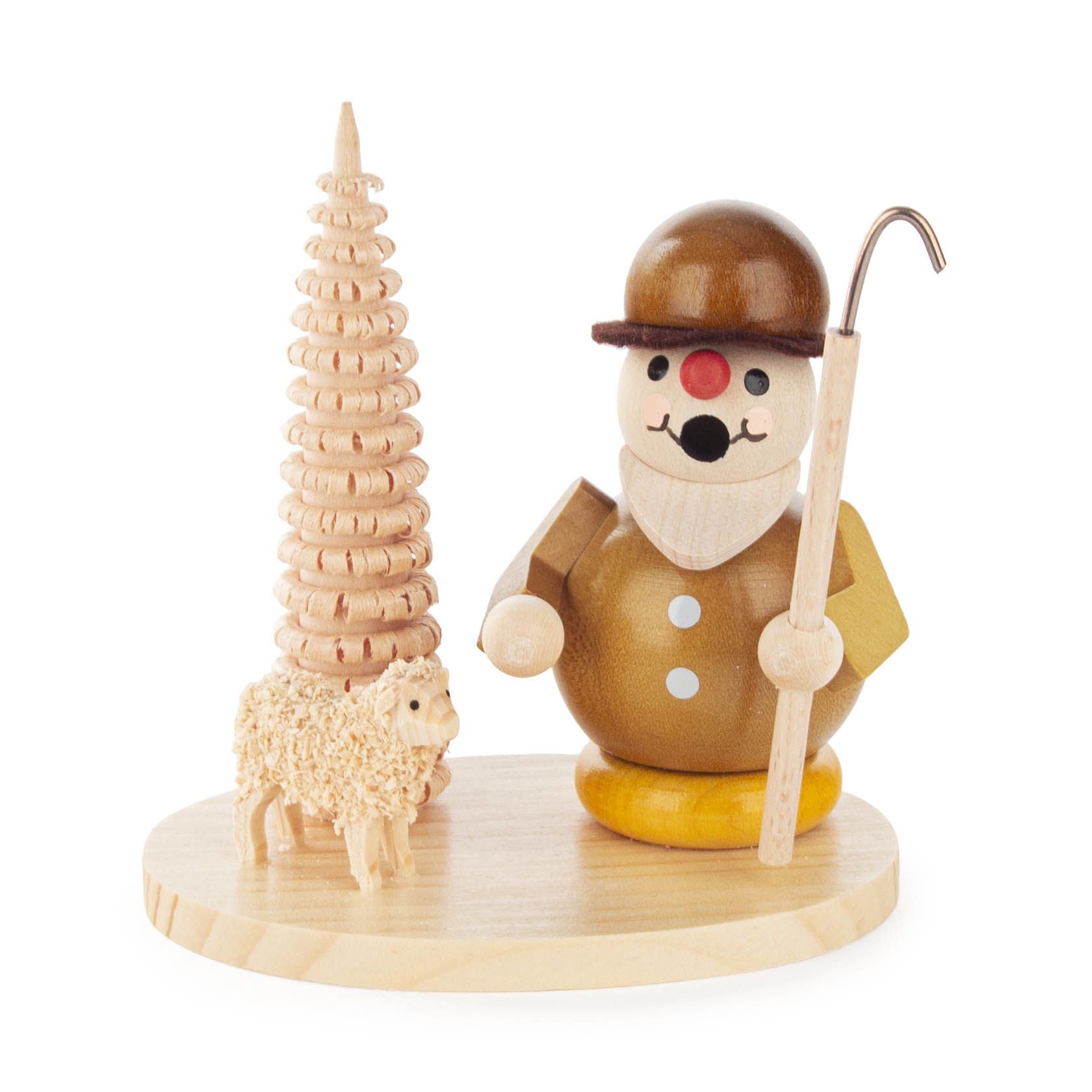 Holzfigur eines Mini-Räuchermanns als Schäfer auf einem Sockel. Der Schäfer hält einen Stab und steht neben einem kleinen Schaf sowie einem holzgeschnitzten Baum. im Dregeno Online Shop günstig kaufen
