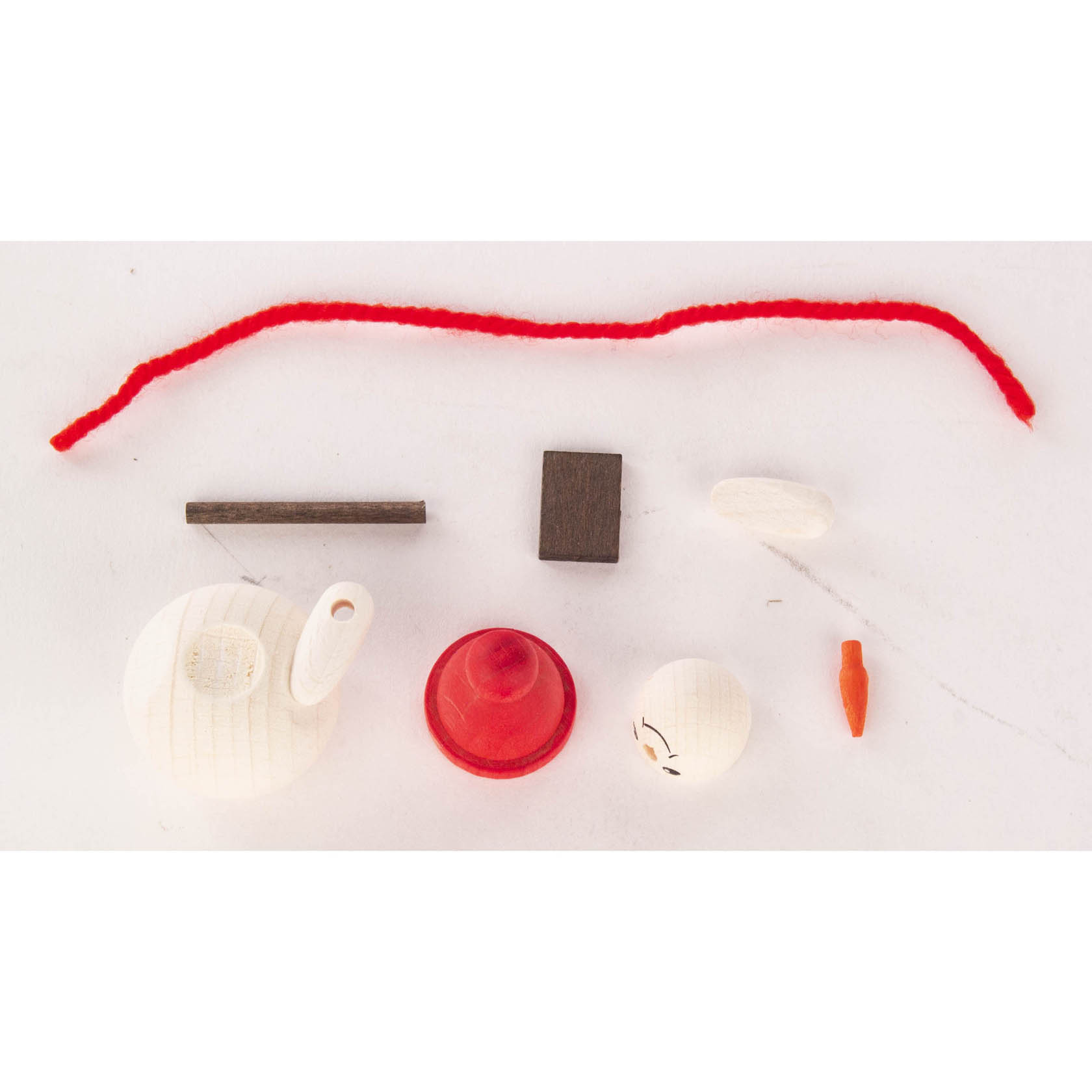 DIY snowman crafting kit with various parts including a red pipe cleaner, a wooden shovel, a snowman's head, and a red hat.