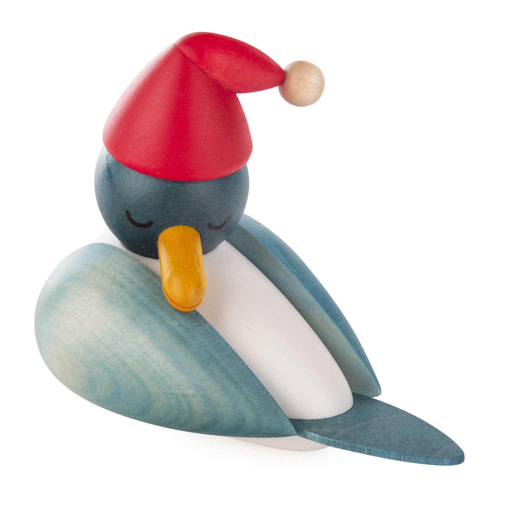 Holzfigur einer schlafenden Möwe mit blauem Körper, einem roten Weihnachtsmütze und einem orangefarbenen Schnabel, auf einem weißen Bauch liegend. im Dregeno Online Shop günstig kaufen
