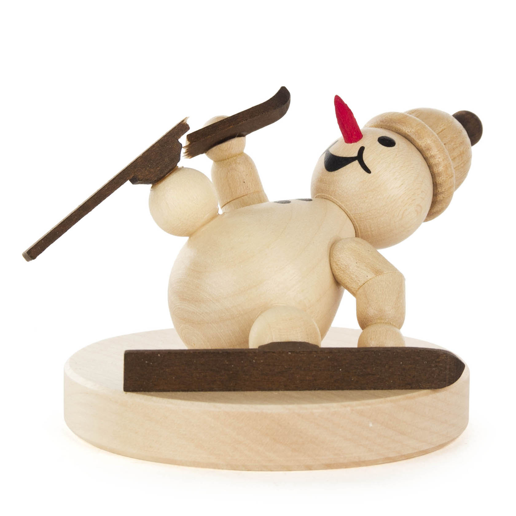 Wooden snowman toy, smiling, wearing a hat, and balancing on one ski with an arm raised. im Dregeno Online Shop günstig kaufen