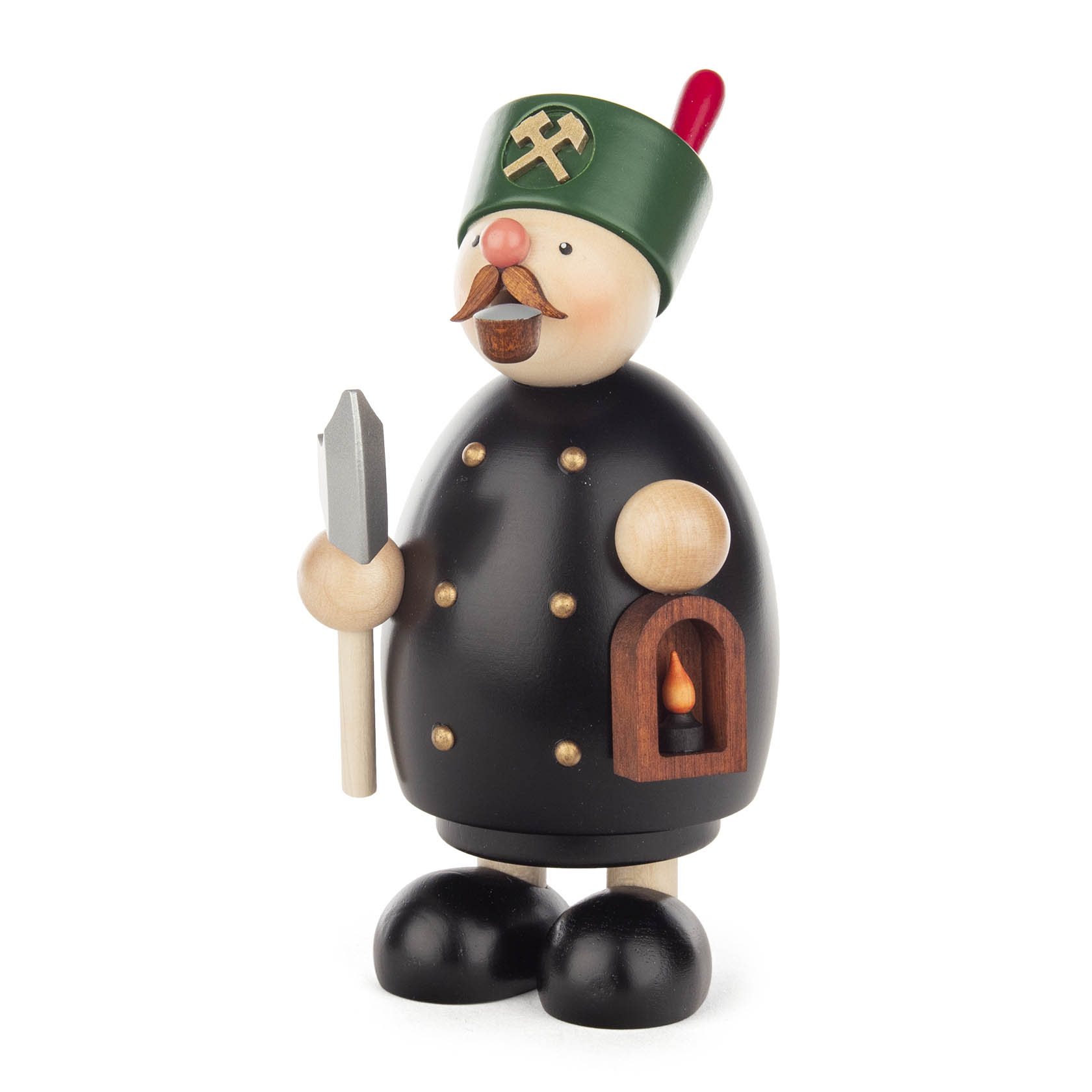 A traditional German incense smoker figurine resembling a miner, wearing a green hat with crossbones and holding a spade, with a small furnace on its belly.