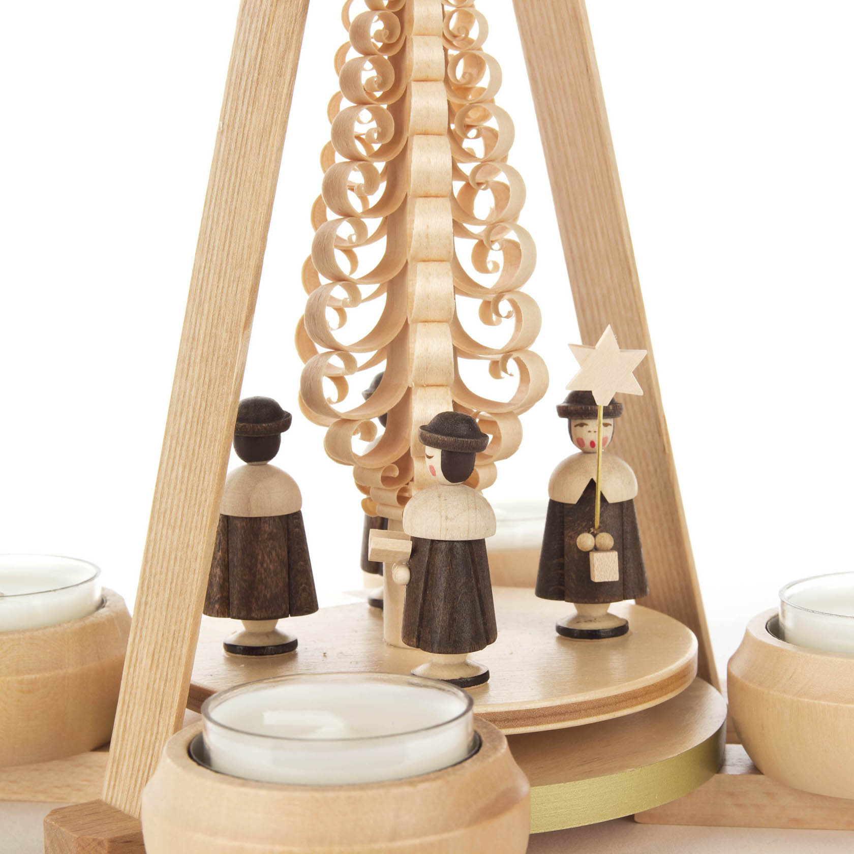 Wooden candle pyramid with three choir figures and spiral decorations for tealights.