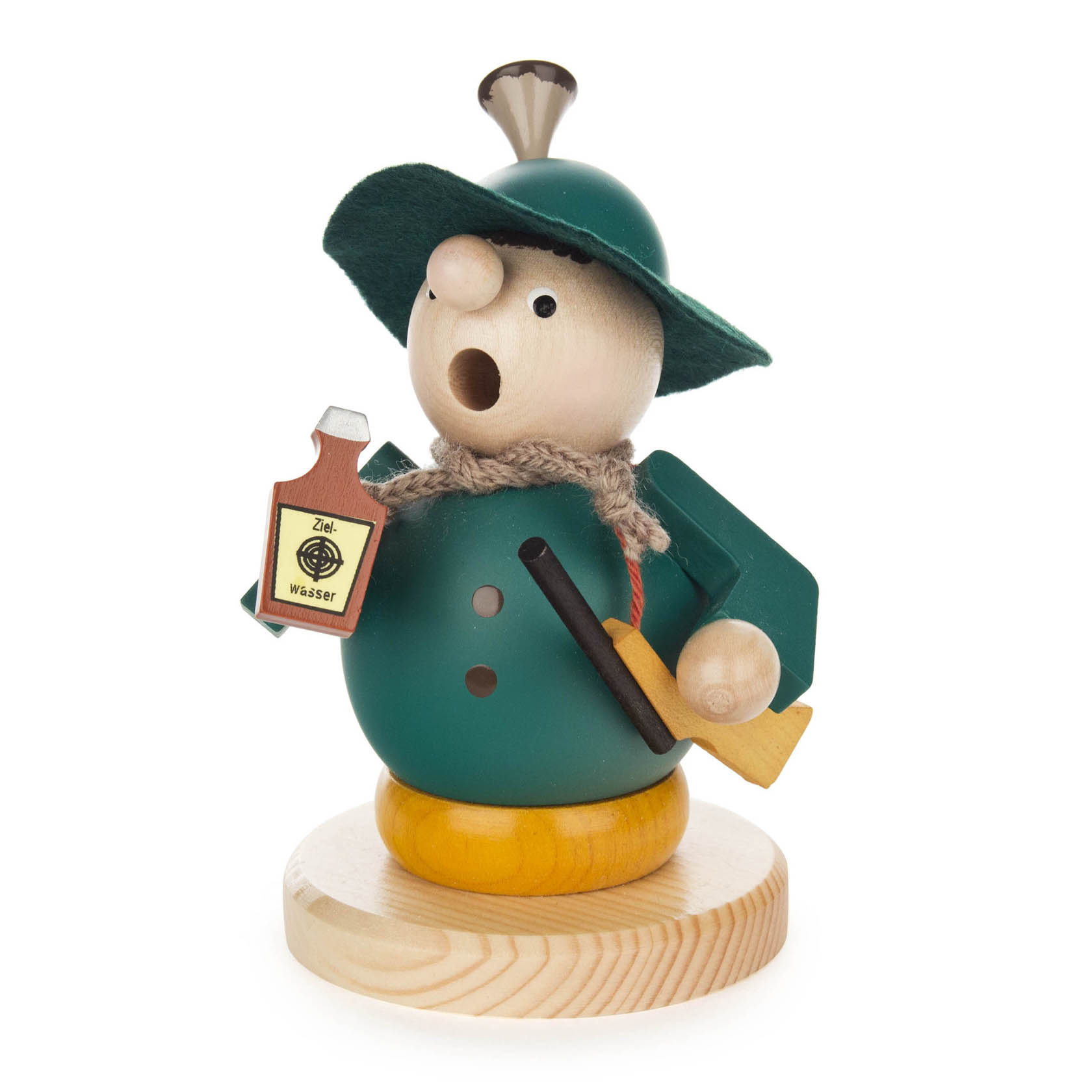 Holzfigur eines Försters in grünem Mantel und Hut, mit Pfeife im Mund. Er hält eine Flasche 'Zielwasser' und hat ein Gewehr über der Schulter. im Dregeno Online Shop günstig kaufen