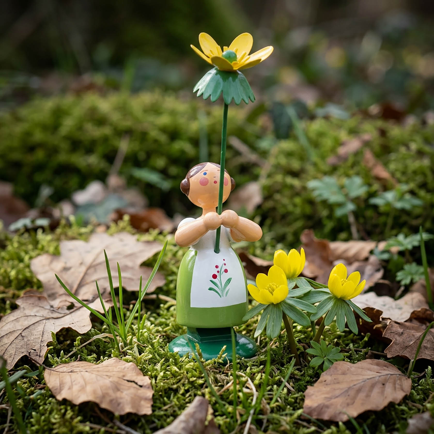 Blumenmädchen mit Winterling