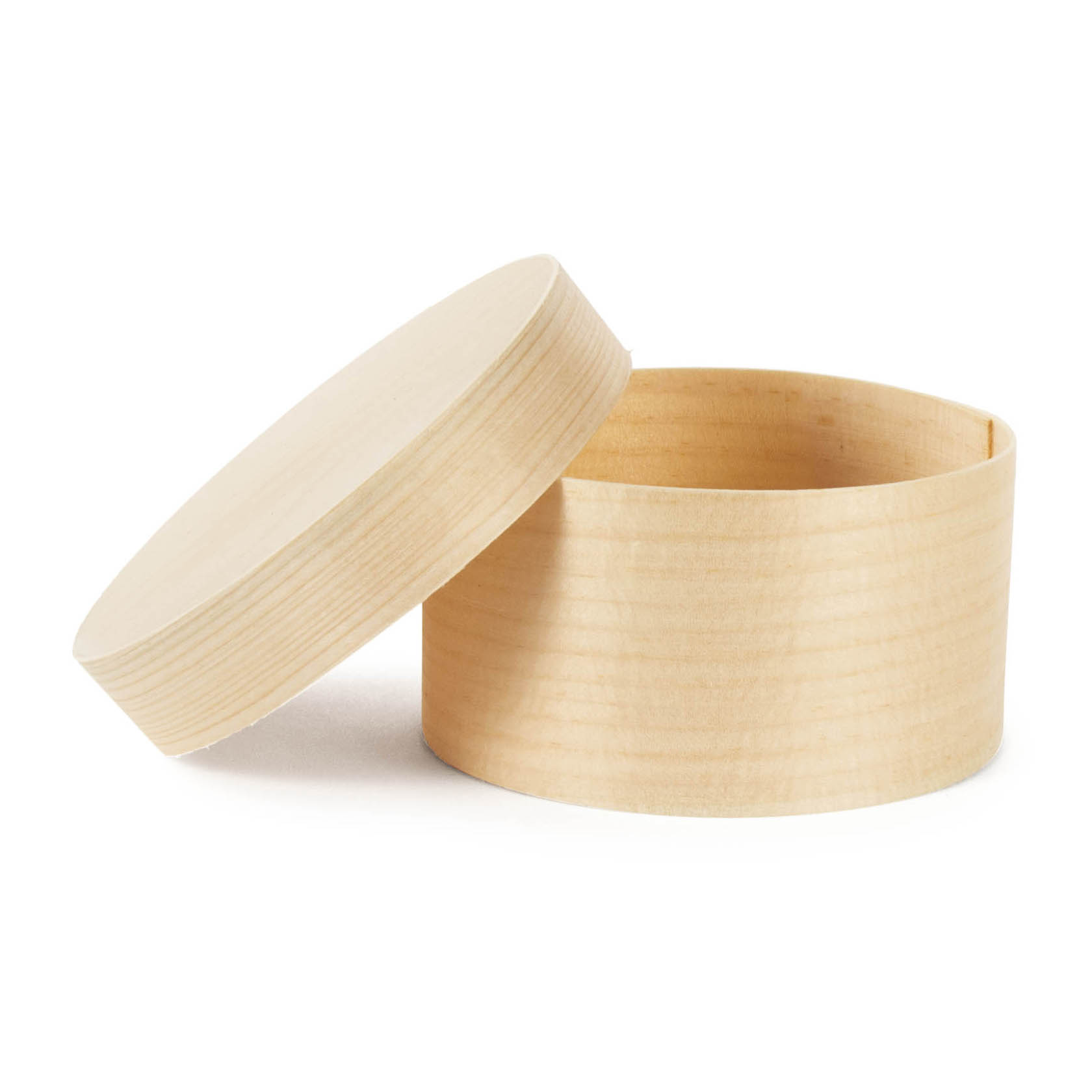 Runde, geöffnete Spanschachtel aus hellem Holz, seitlich liegender abgenommener Deckel.