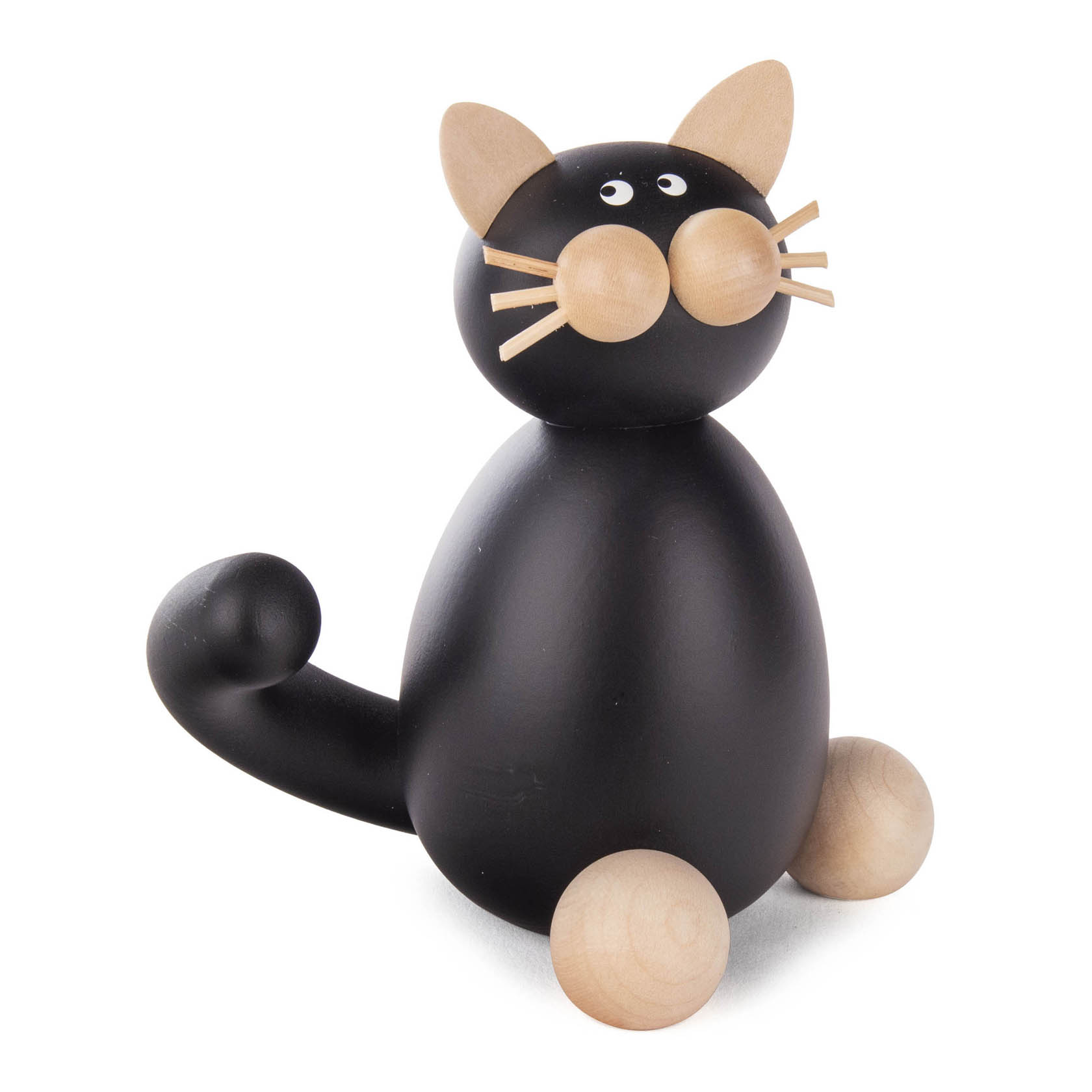 Eine stilisierte, sitzende schwarze Holzkatze mit großen, runden Augen und hellen Holzohr- und Mundpartien. im Dregeno Online Shop günstig kaufen