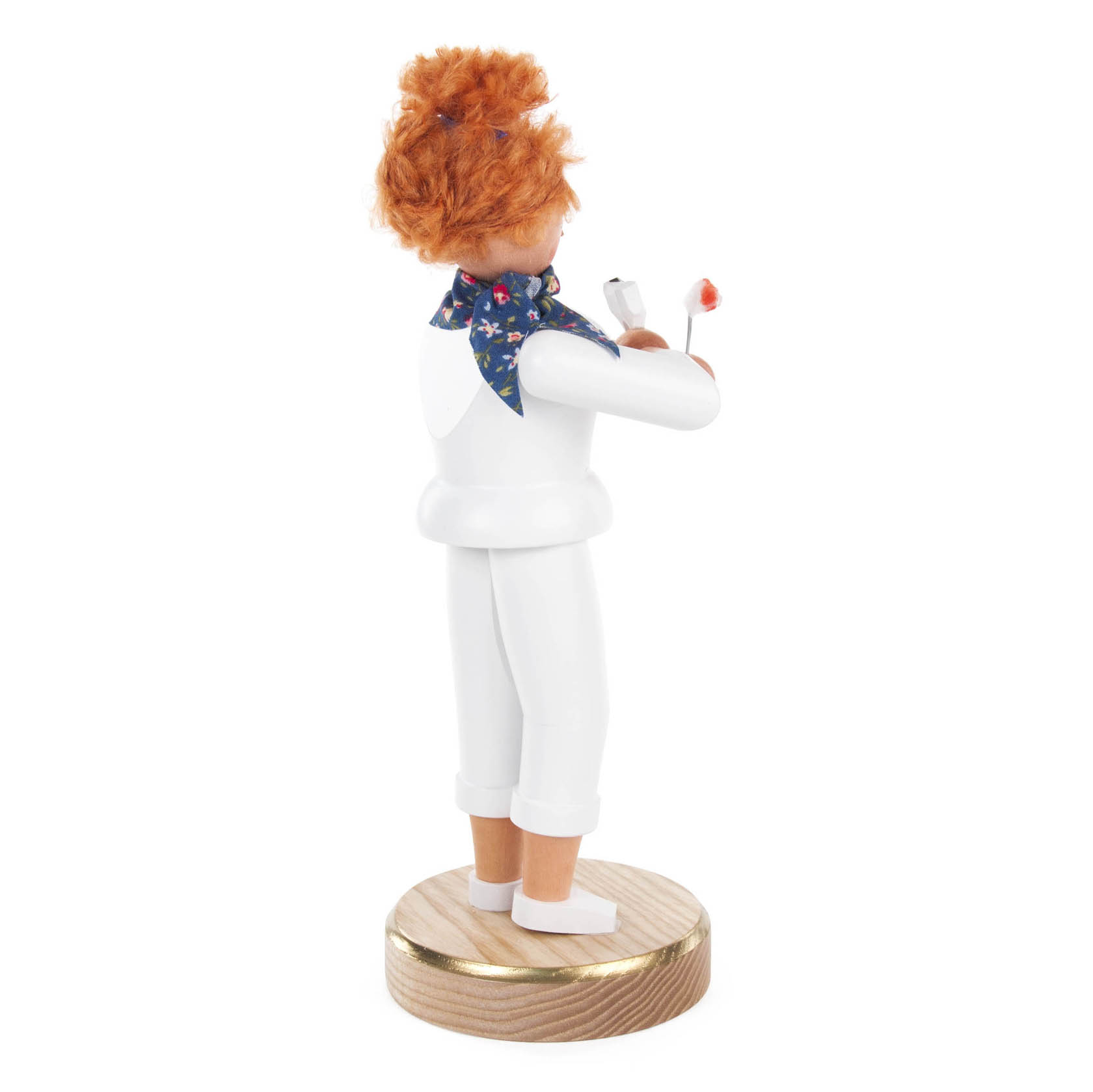 Wooden incense smoker figure of a female dentist with curly red hair, wearing a white coat and holding a toothbrush and toothpaste.