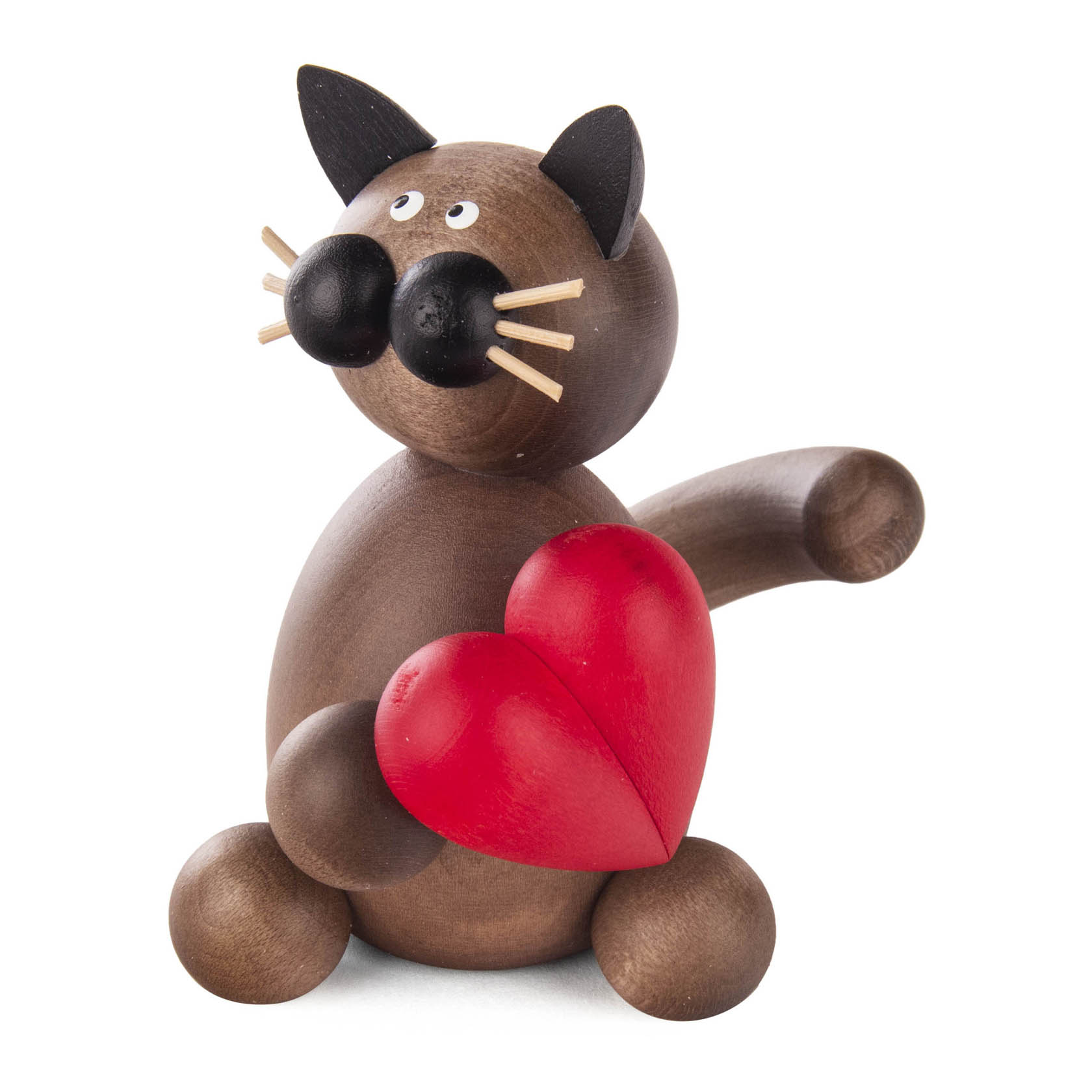 Holzfigur einer grauschwarzen Katze mit herzförmigem roten Objekt in den Pfoten. im Dregeno Online Shop günstig kaufen