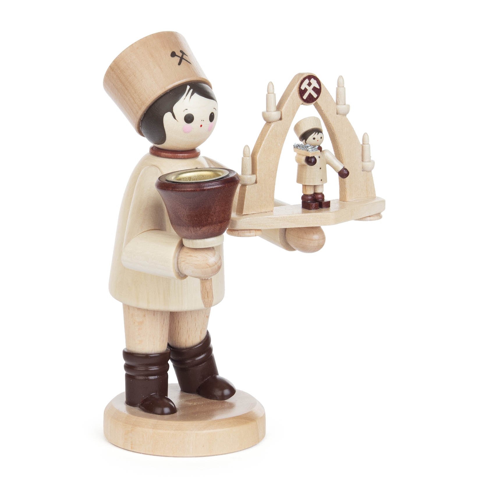 Wooden miner figure holding a candle holder with a LUMIX LED candle and a miniature arch with figurine.