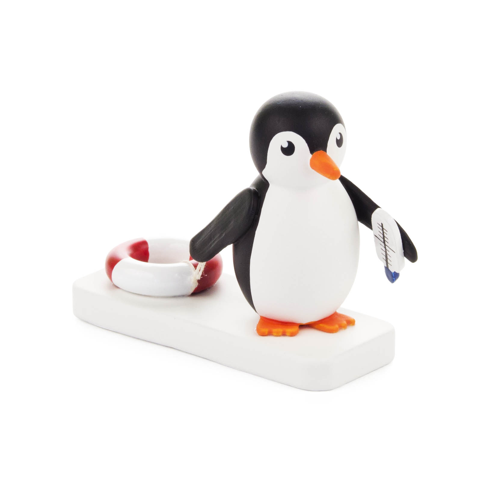 Spielzeugfigur eines Pinguins mit Rettungsring und Trillerpfeife in der Hand, stehend auf einer rechteckigen Basis. im Dregeno Online Shop günstig kaufen