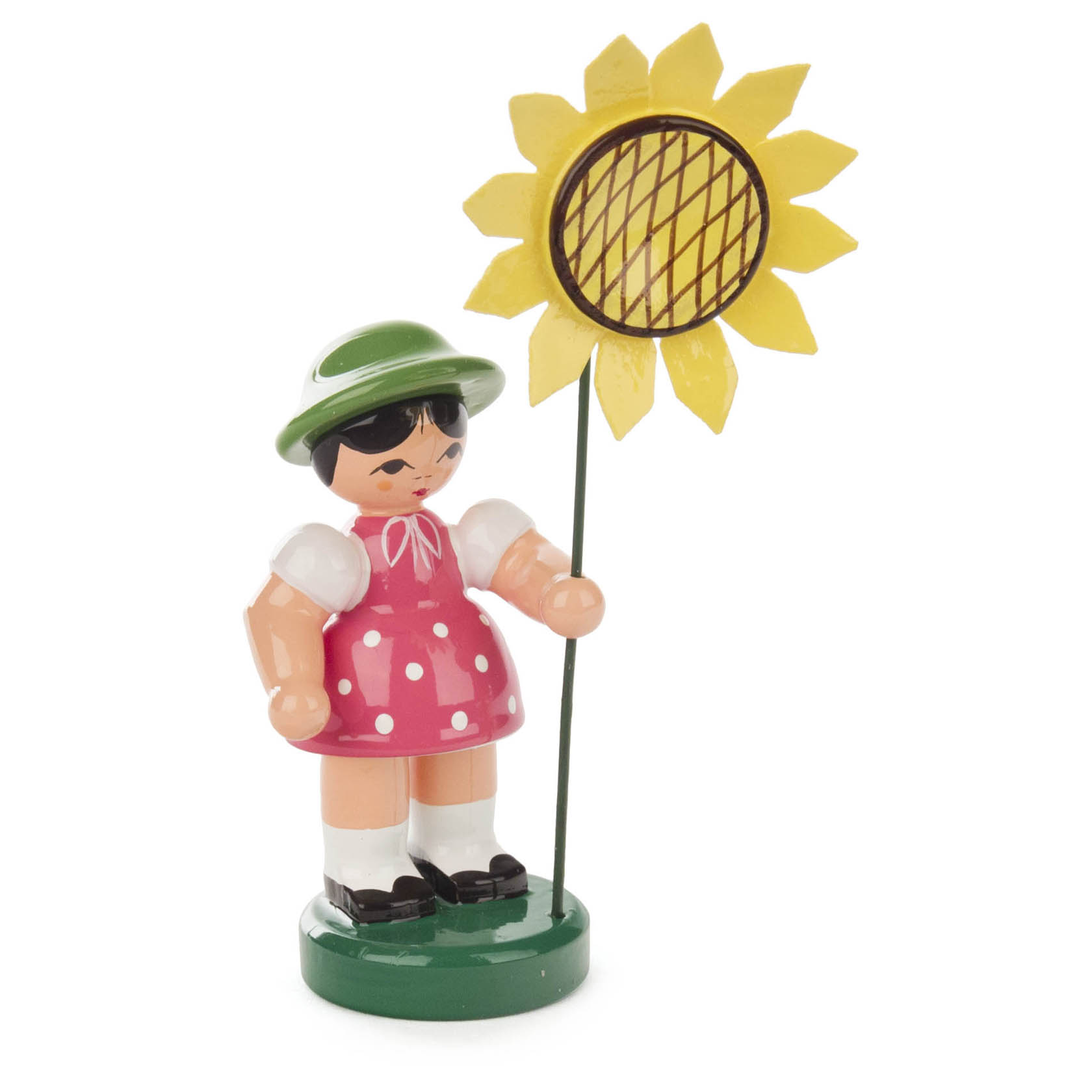 Figur eines Mädchens in rosa Kleid mit weißen Punkten und grünem Hut, das eine große gelbe Blume mit Gitternetzmuster hält. im Dregeno Online Shop günstig kaufen