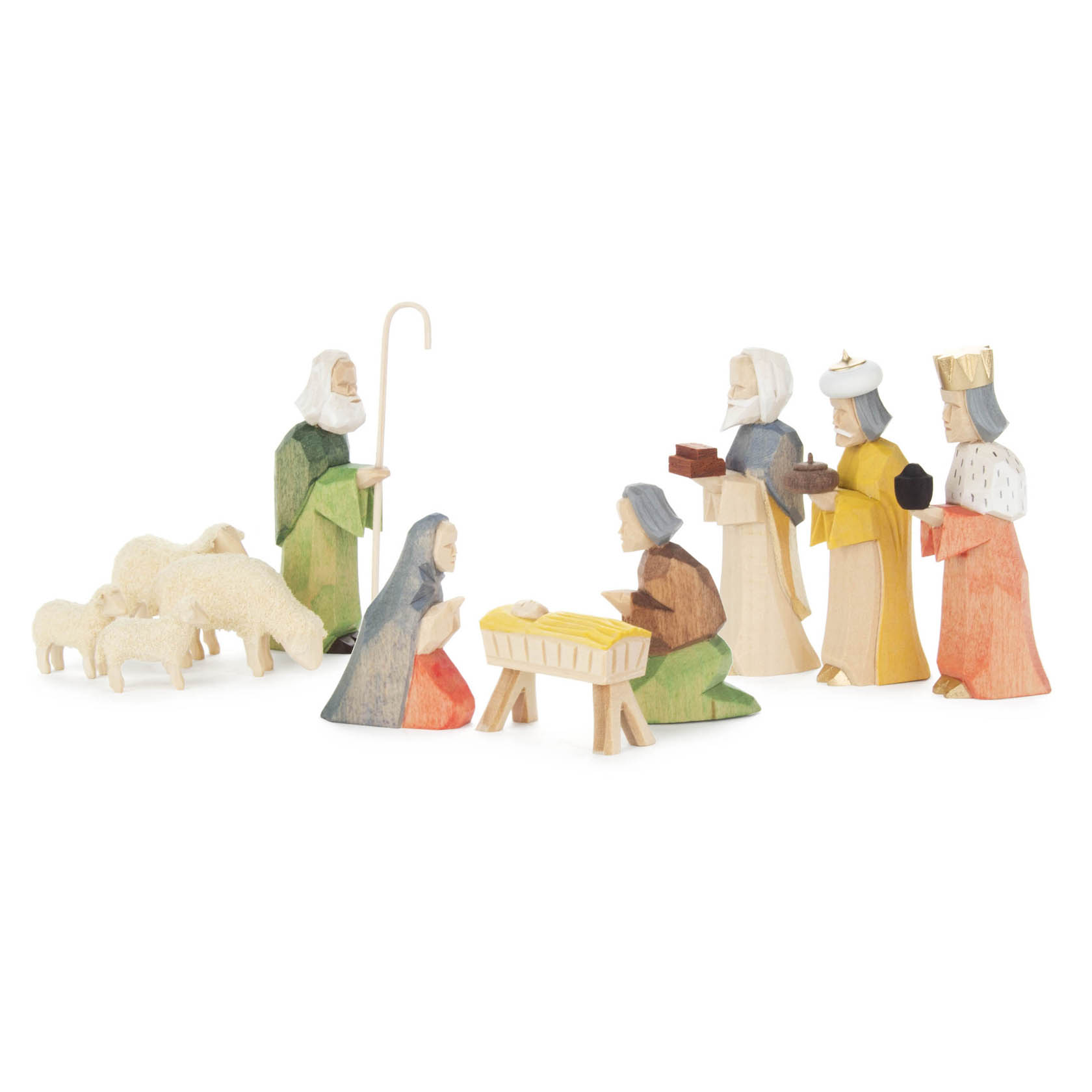 Elf handgeschnitzte, farbenfrohe Krippenfiguren aus Holz: Maria, Josef, das Jesuskind in der Krippe, drei Weise, ein Hirte, drei Schafe. im Dregeno Online Shop günstig kaufen