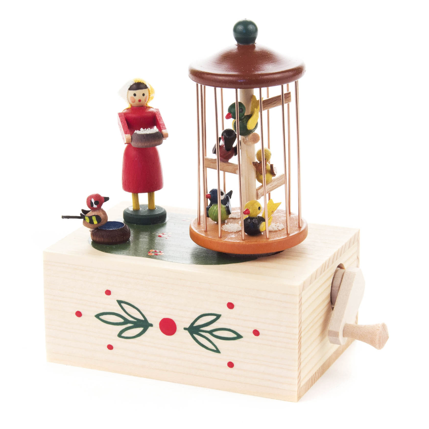 Holzkästchen mit Kurbel und einem Vogelkäfig-Design. Eine Holzfigur in rotem Kleid steht daneben, während Vögel im Käfig sitzen. im Dregeno Online Shop günstig kaufen