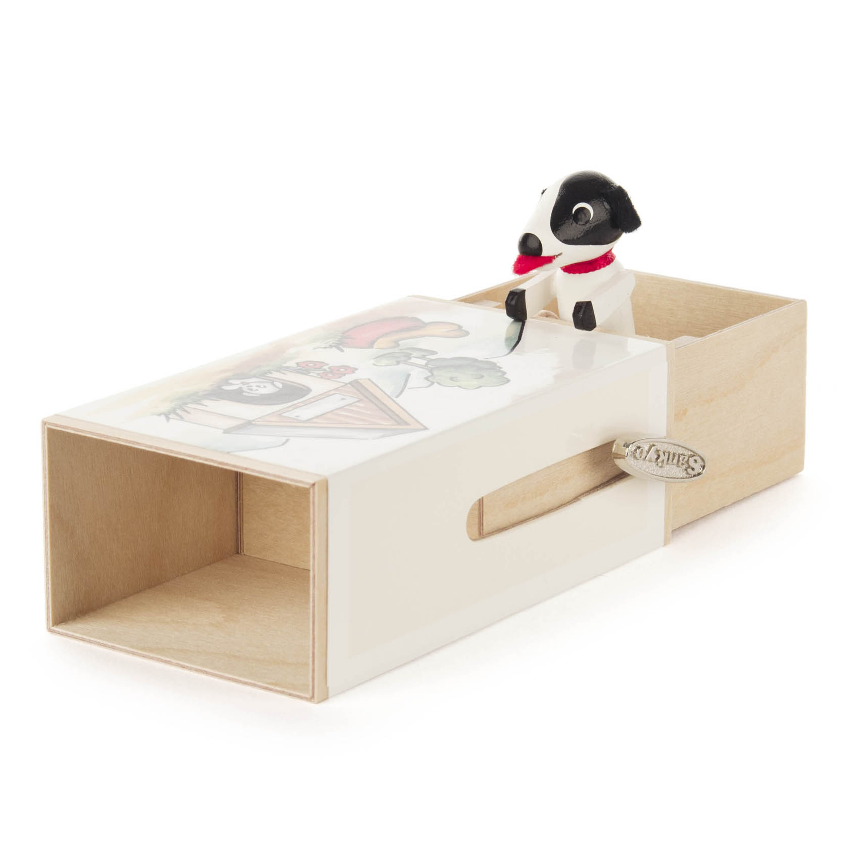 A wooden slide box toy with a dog figure. The box features a handle and an illustrated top with a playful scene, and a small dog pops up when opened.