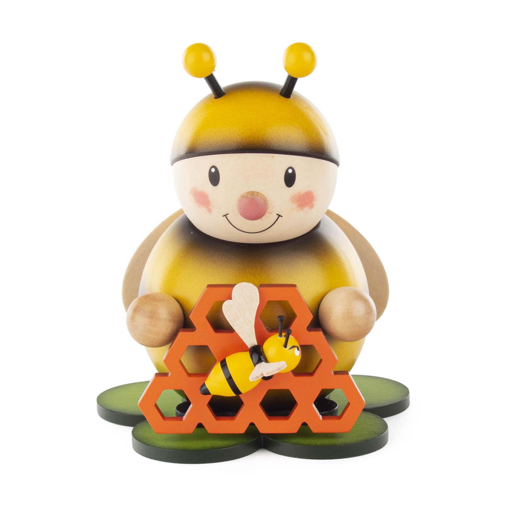 Holzfigur einer lächelnden Hummel mit orangefarbenen Honigwaben und einer kleinen Biene darauf, die auf einem grünen Sockel sitzt. im Dregeno Online Shop günstig kaufen