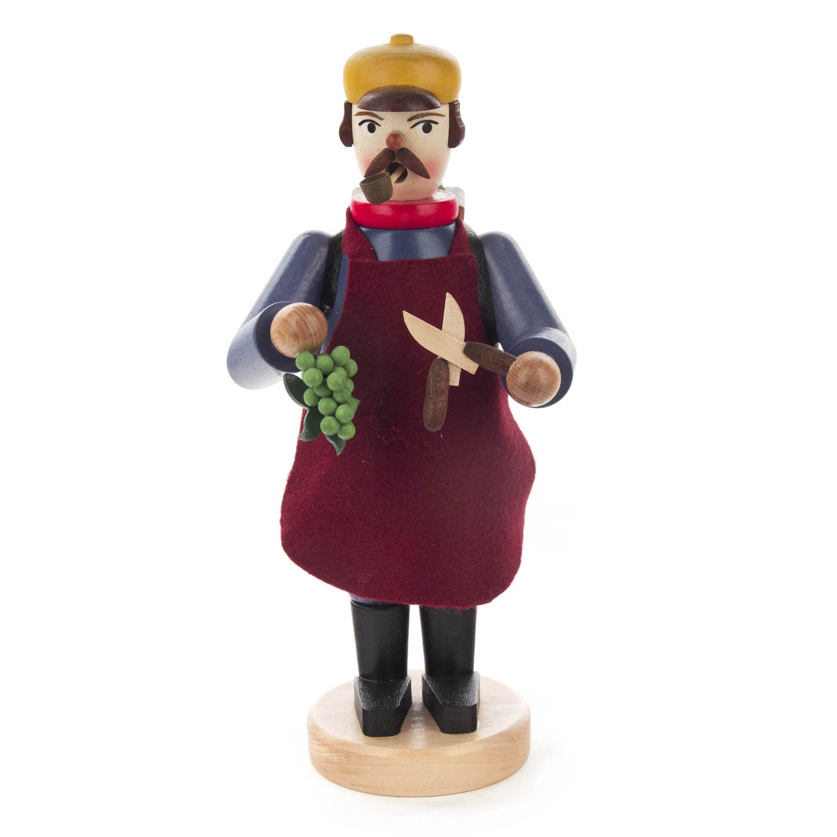Ein traditioneller Räuchermann in Gestalt eines Winzers, mit roter Schürze und Trauben in einer Hand, die andere Hand hält ein Werkzeug. im Dregeno Online Shop günstig kaufen
