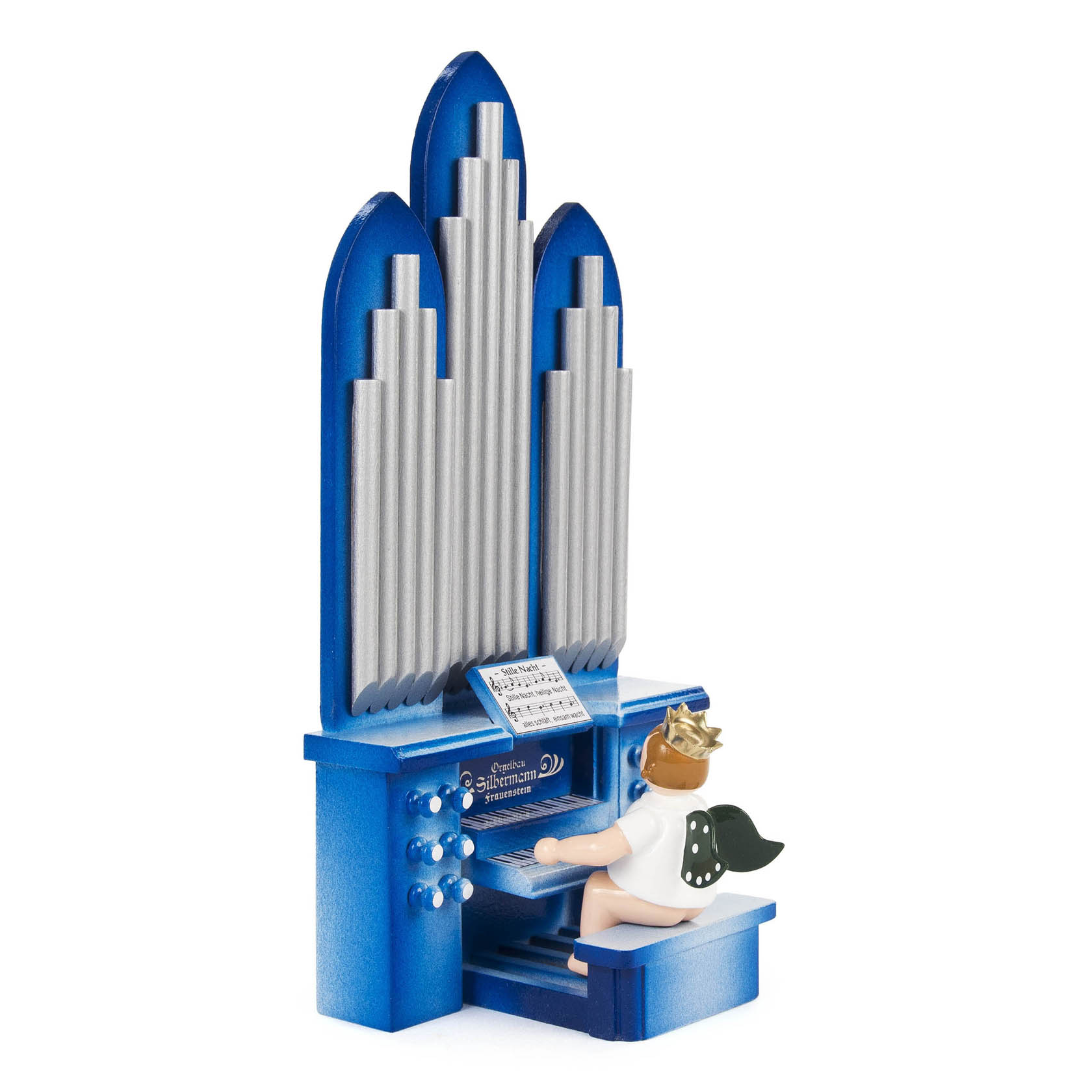 Ein kleiner Engel mit Krone sitzt an einer blauen Orgel und spielt. Die Orgel hat große silberne Orgelpfeifen und ein Notenblatt liegt auf dem Pult.