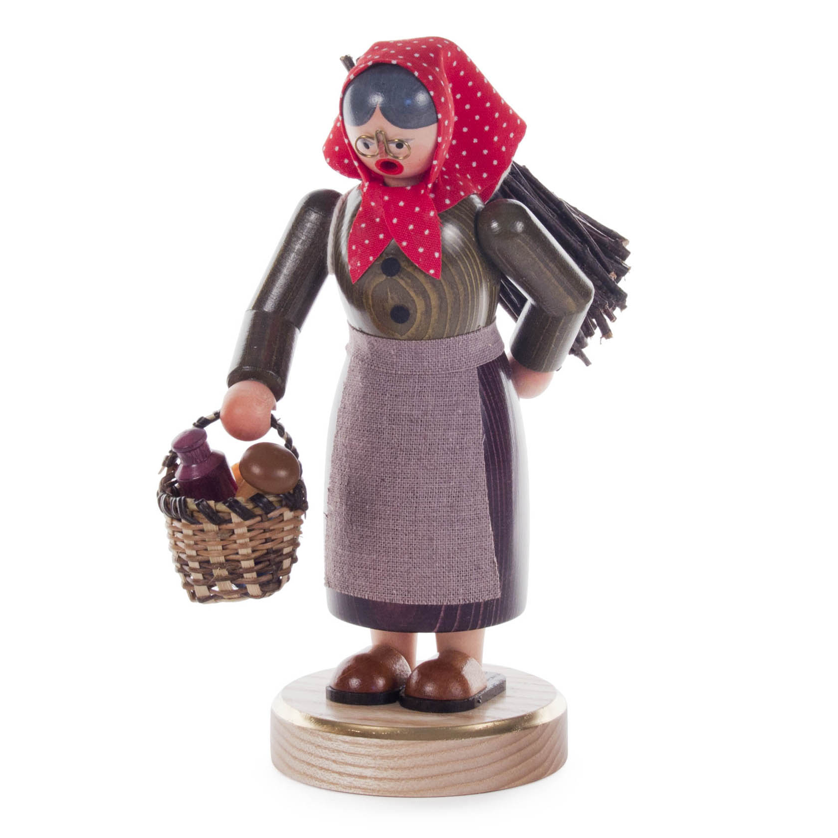 A wooden incense figure of an elderly woman, the Buschweibel, with a red headscarf, glasses, apron, and a basket filled with mushrooms, standing on a wooden base. im Dregeno Online Shop günstig kaufen