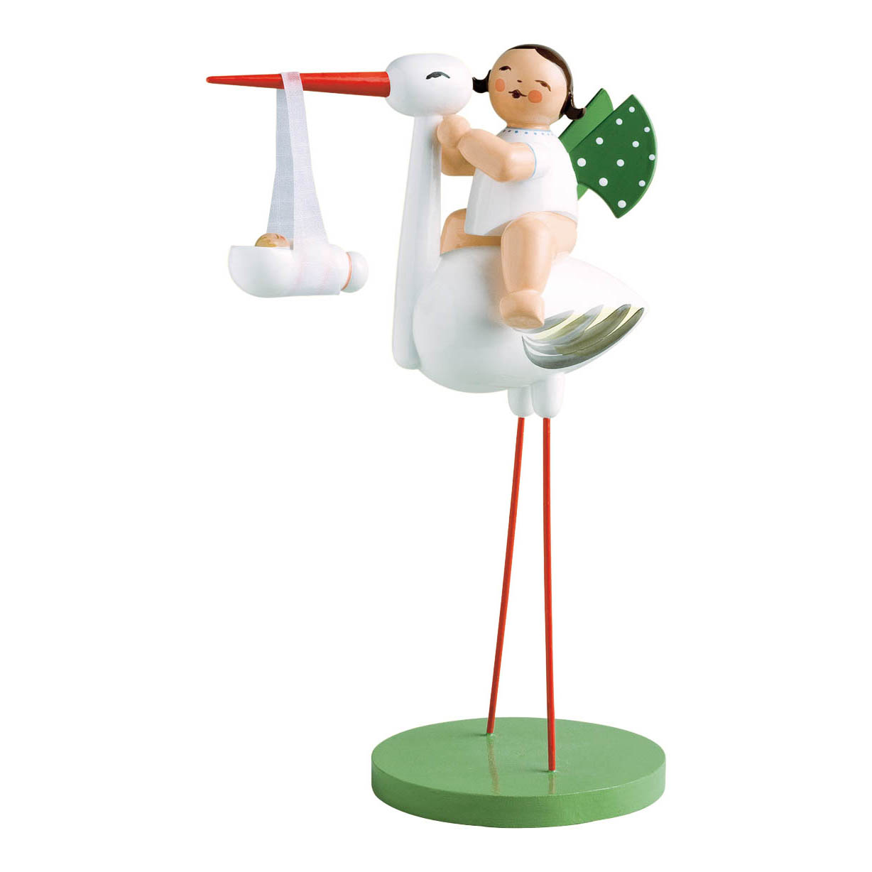 Eine Holzfigur stellt einen Storch dar, der ein Wickelkind in einem Tuch trägt, während ein Mädchen auf seinem Rücken sitzt. Das Mädchen hat dunkle Haare und trägt Grün. im Dregeno Online Shop günstig kaufen