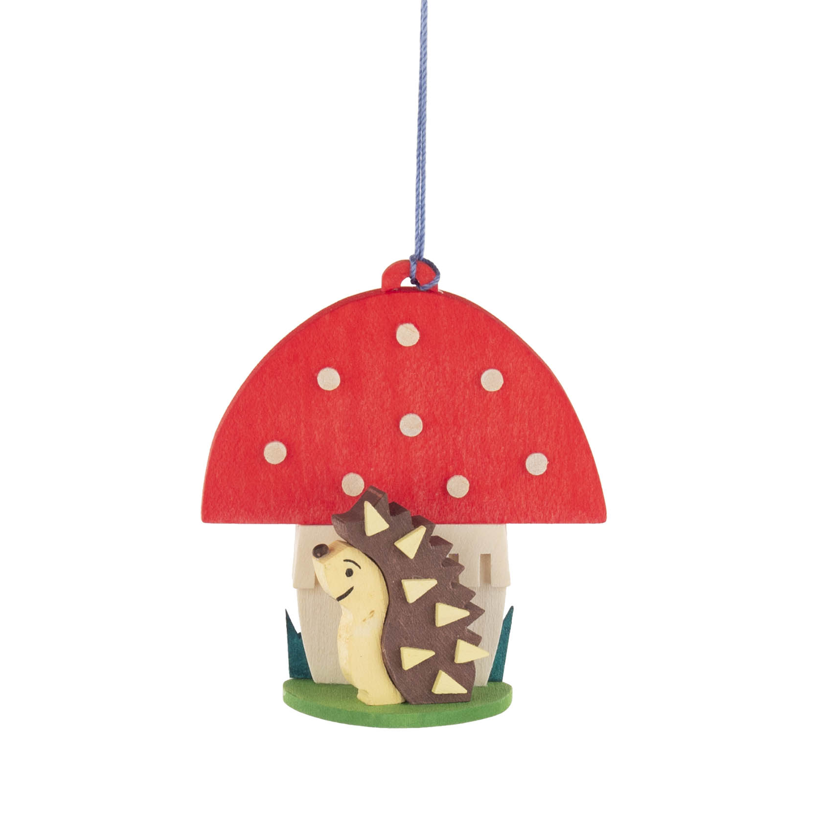 Hängende Dekoration in Form eines Fliegenpilzes mit rotem Hut und weißen Punkten, unter der ein Igel sitzt. im Dregeno Online Shop günstig kaufen