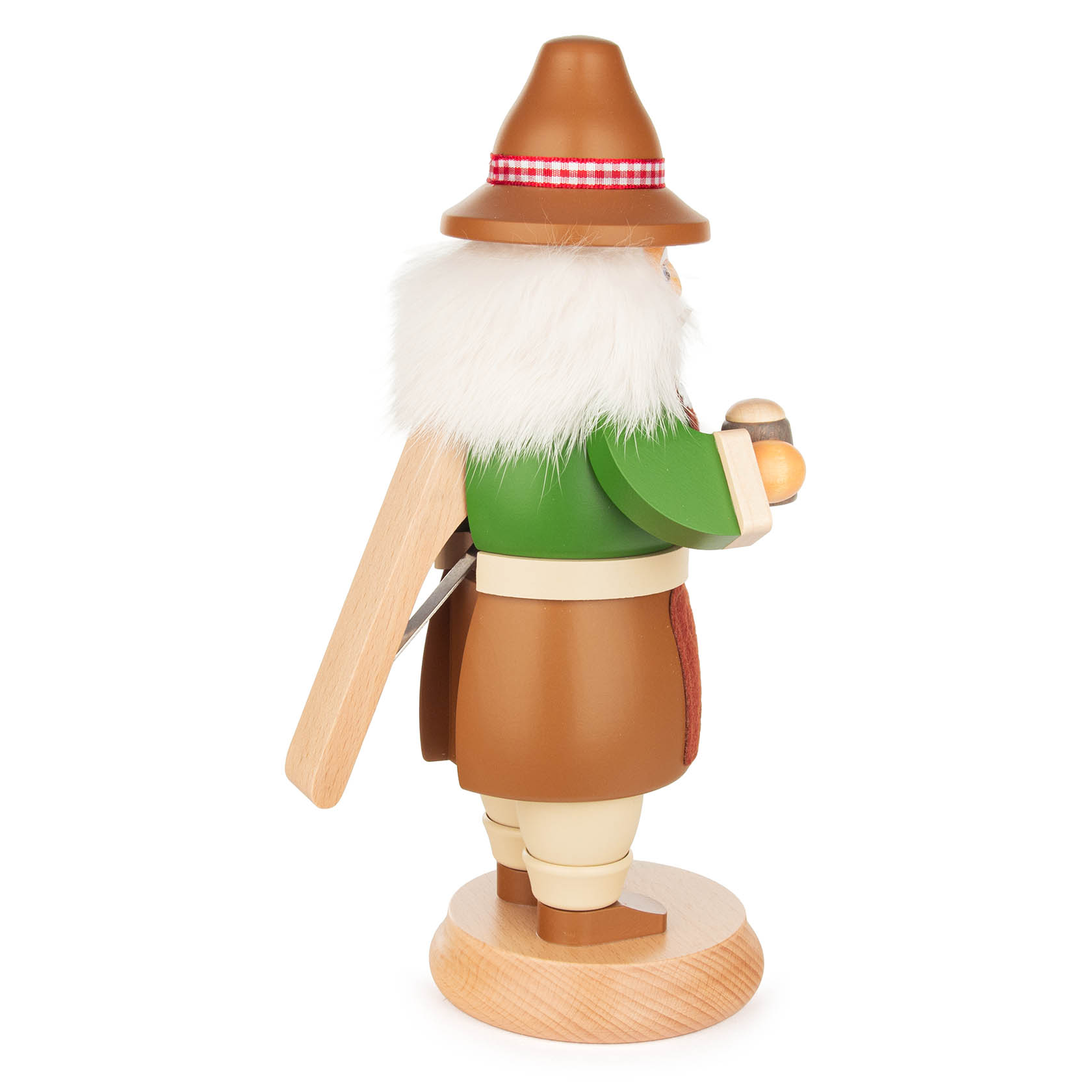 Holzfigur eines rauchenden Nussknackers im Bayernkostüm mit grüner Jacke, braunem Hut und kariertem Band, auf einem Sockel stehend.