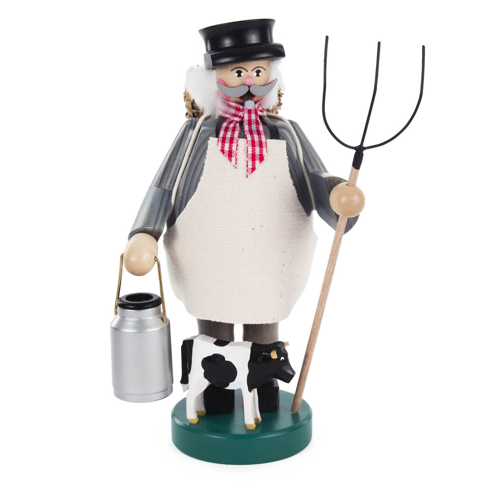 Ein hölzerner Räuchermann in Bauernkleidung mit schwarzem Hut, rotem Halstuch, weißer Schürze, hält eine Mistgabel und eine Milchkanne, mit einer kleinen Kuhfigur an den Füßen. im Dregeno Online Shop günstig kaufen