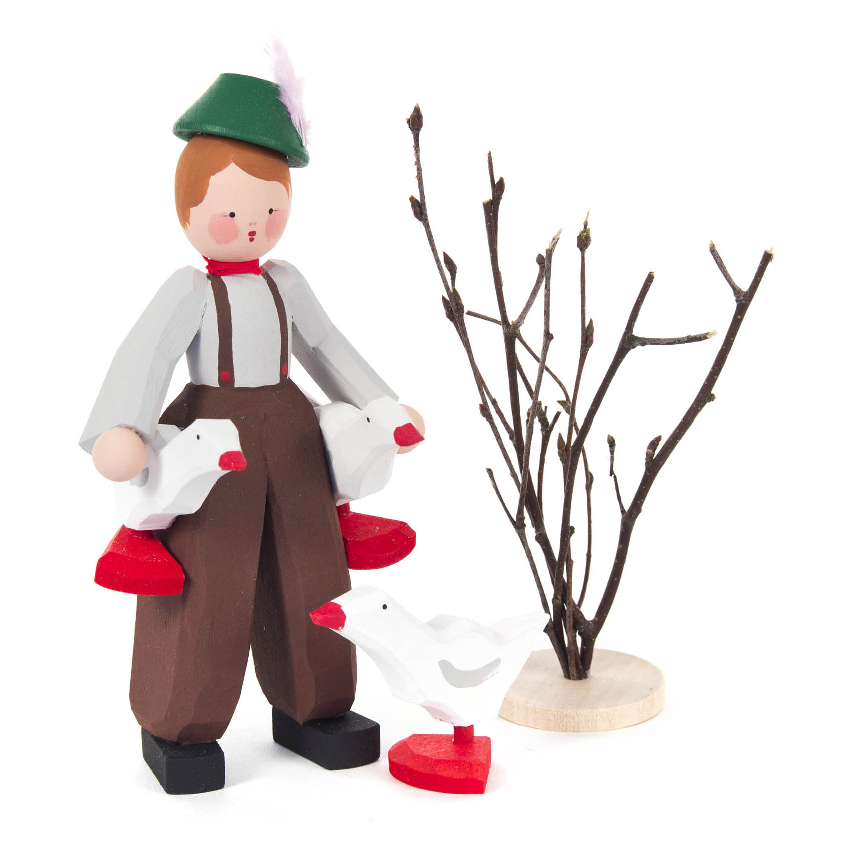 Holzfigur eines Jungen mit grüner Mütze und roter Wangen, der zwei weiße Gänse in den Händen und eine dritte Gans zu seinen Füßen hält. im Dregeno Online Shop günstig kaufen