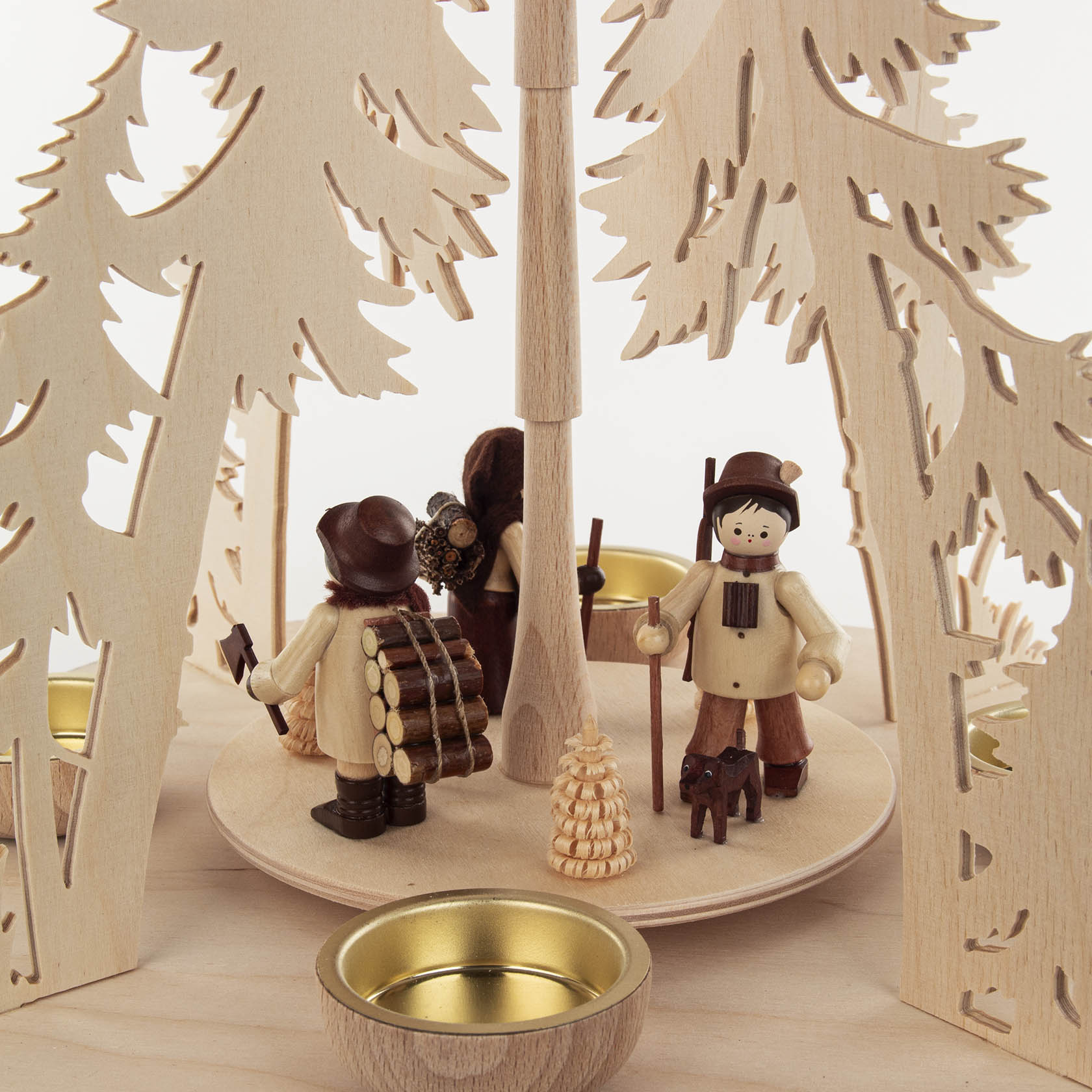 wooden pyramid with forest people
