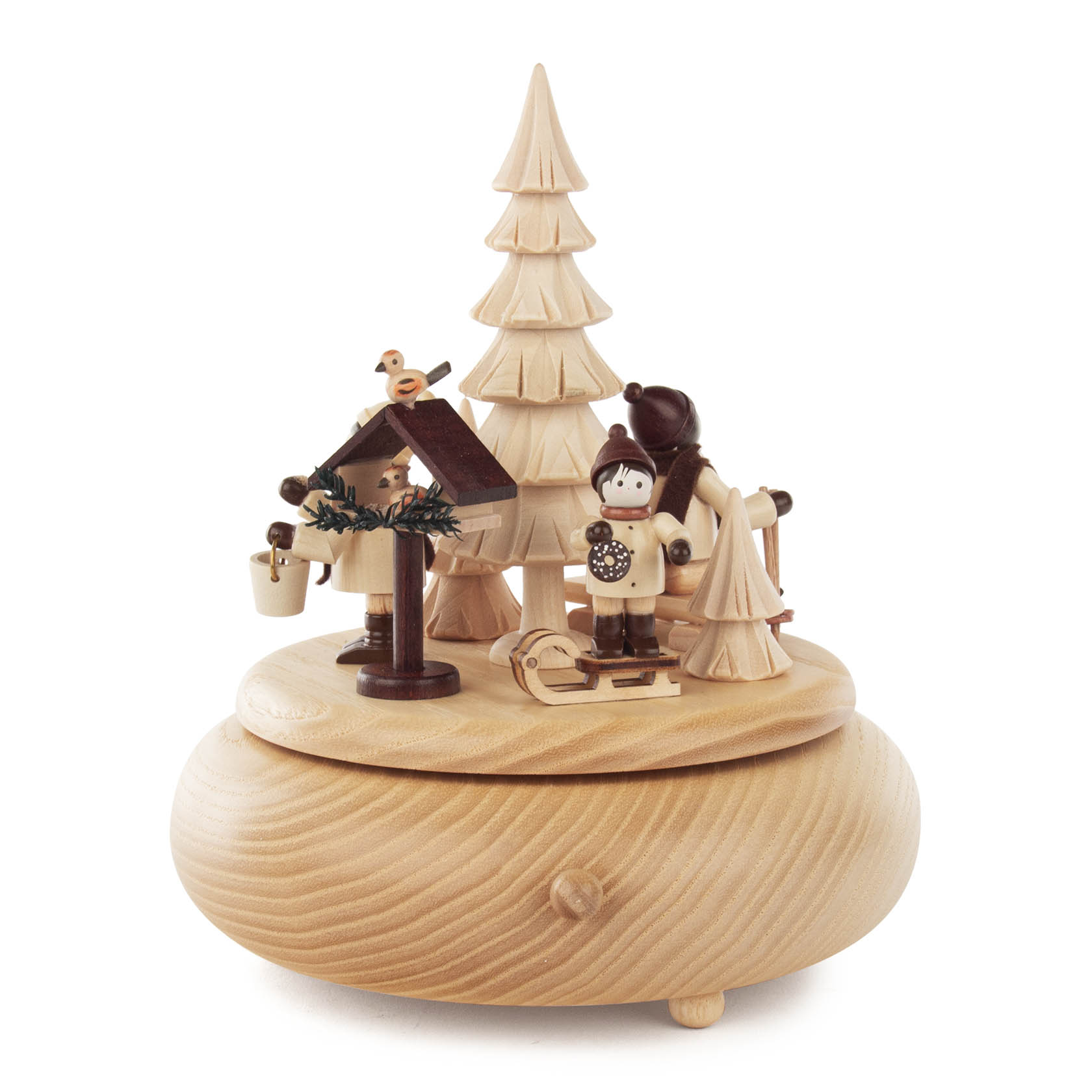 Holzspieldose mit Wintermotiv: Zwei Kinder mit Schlitten und Eimer neben einem Vogelhaus, auf dem ein Vogel sitzt. Im Hintergrund stehen zwei Tannenbäume.