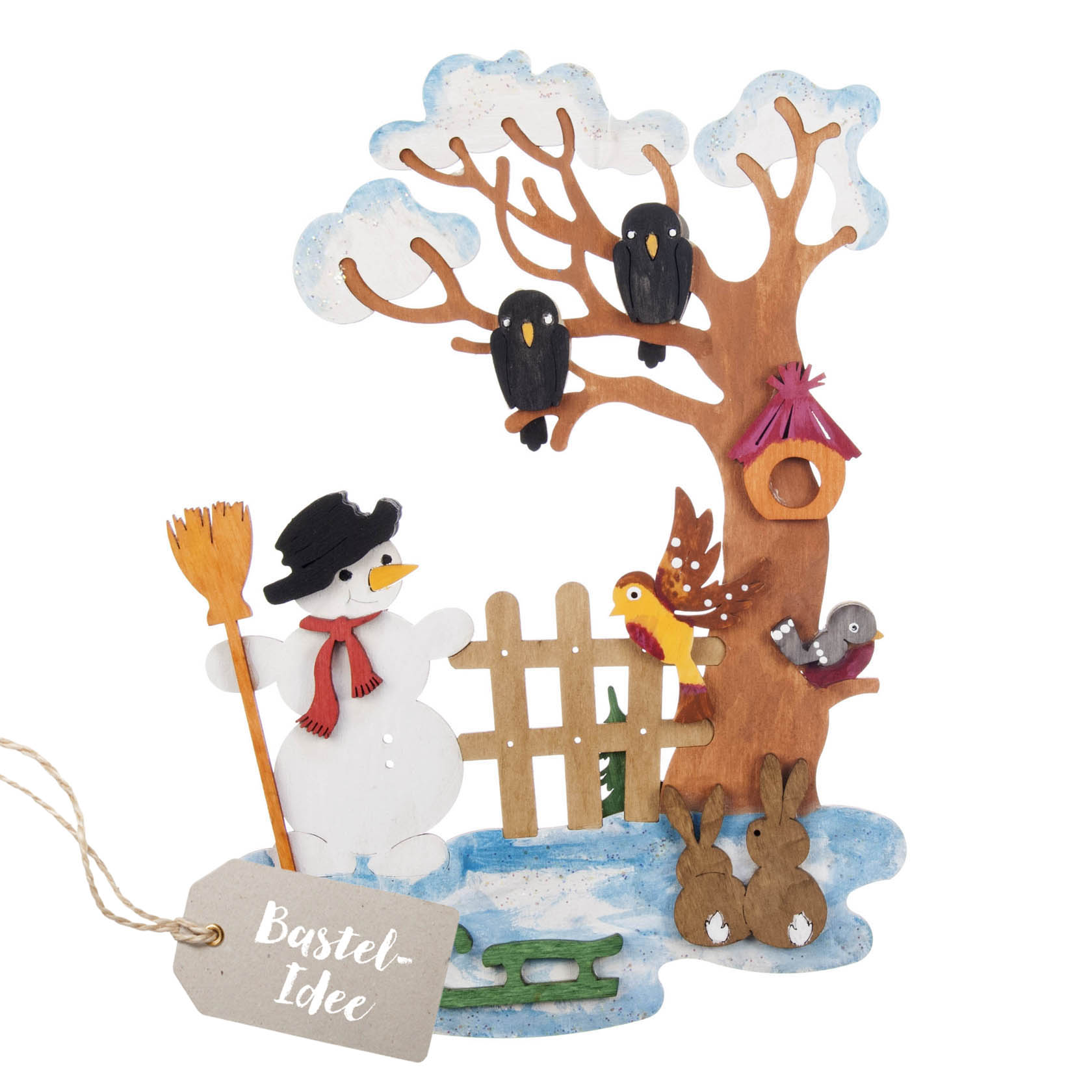 Craft kit for a winter window picture showing a snowman with a broom, two blackbirds on a tree, a birdhouse, a yellow bird, a squirrel, two rabbits, and a sled. im Dregeno Online Shop günstig kaufen