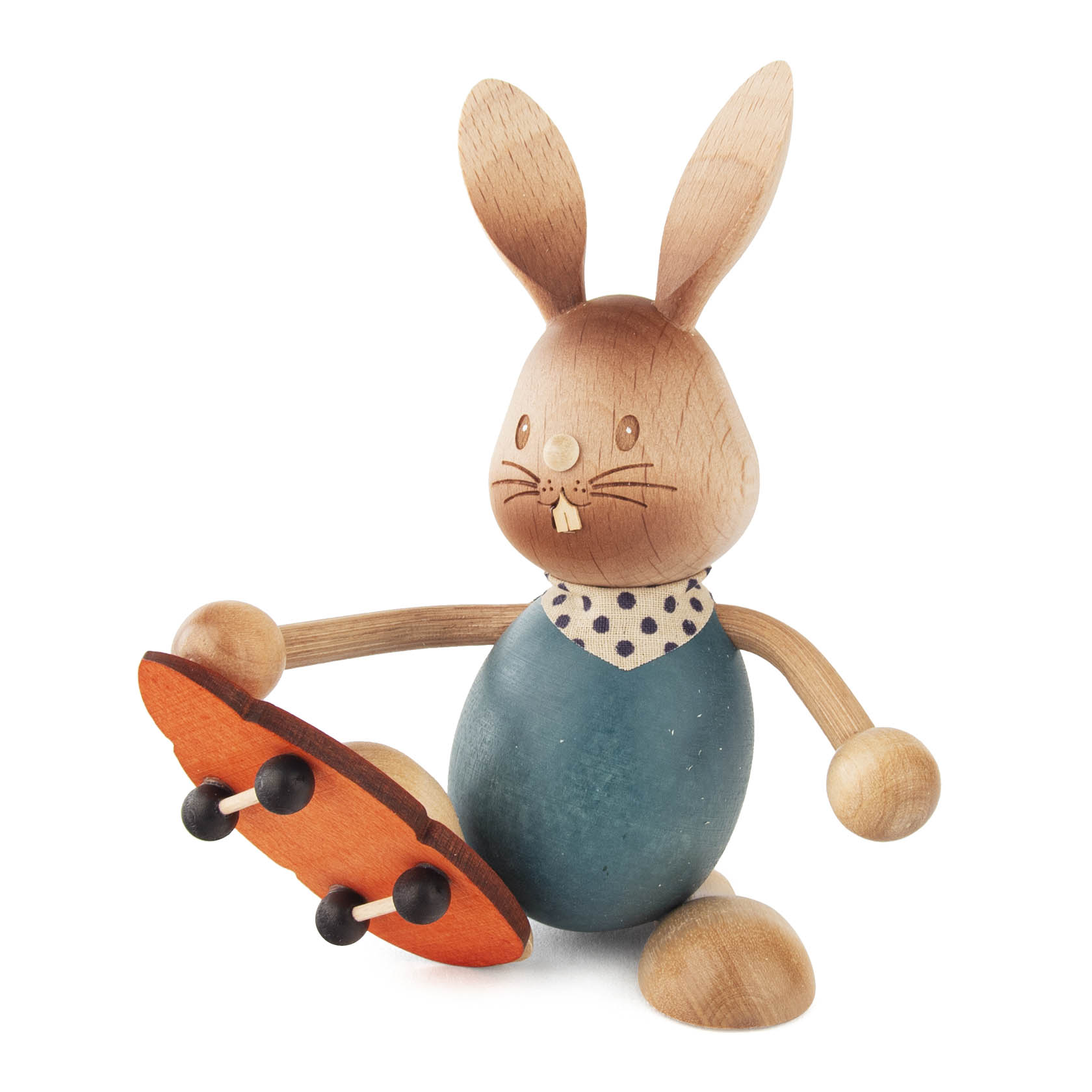 Holzhase 'Stupsi' mit blauem Körper, gepunktetem Schal und rotem Skateboard im Dregeno Online Shop günstig kaufen