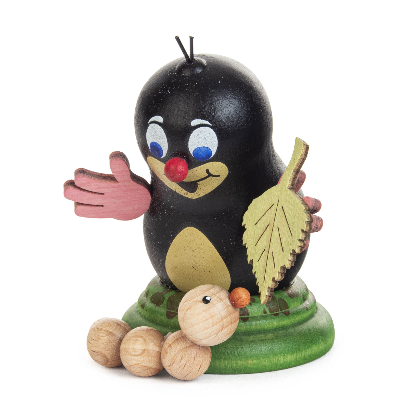 A cute wooden figure of a mole with a bright red nose, holding a wooden leaf in one hand, and a pink waving hand, with a wooden caterpillar below. im Dregeno Online Shop günstig kaufen