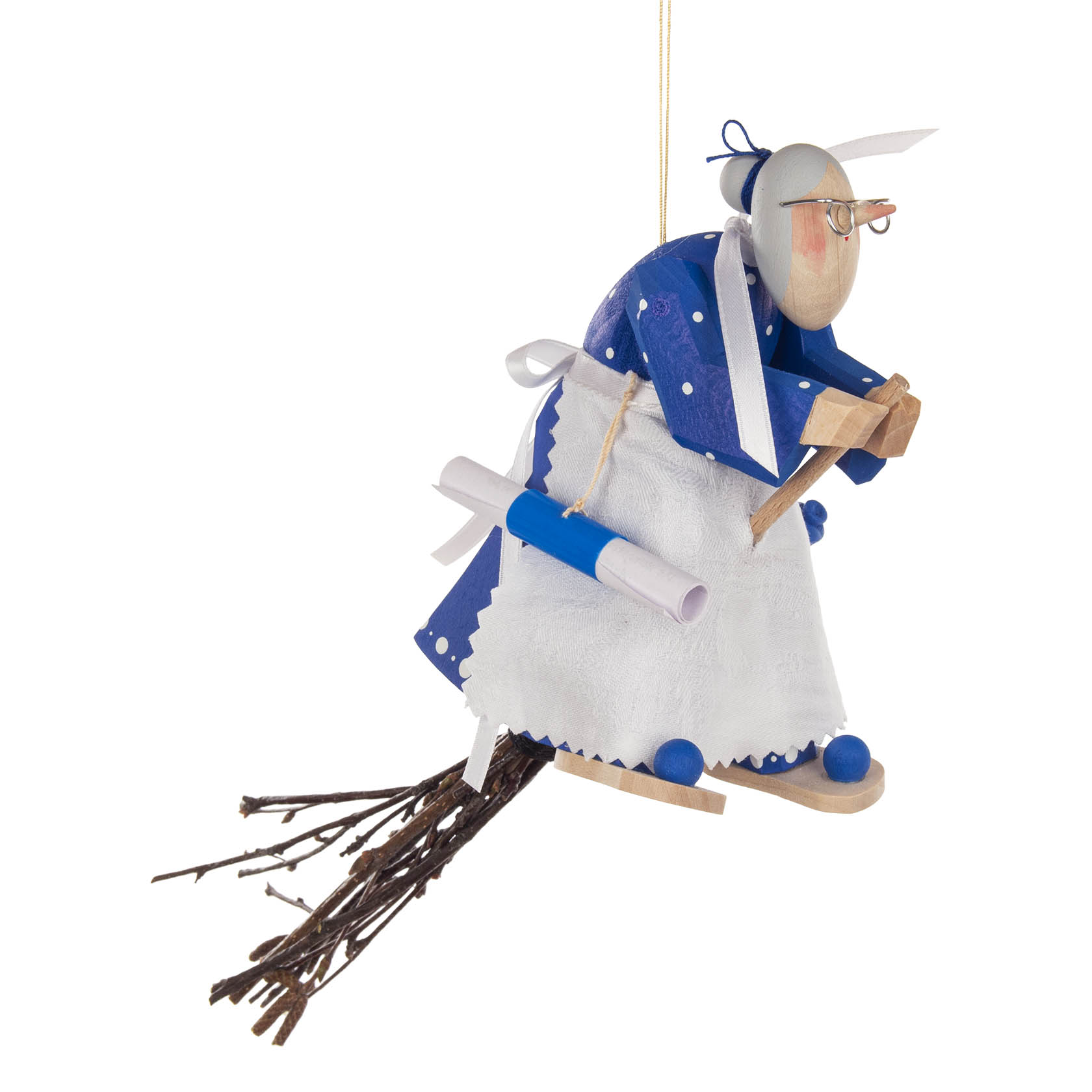 Holzfigur einer Küchenhexe auf einem Besen fliegend, liebevoll geschnitzt und zum Aufhängen geeignet. Sie trägt eine blaue Kleidung und eine weiße Schürze. im Dregeno Online Shop günstig kaufen
