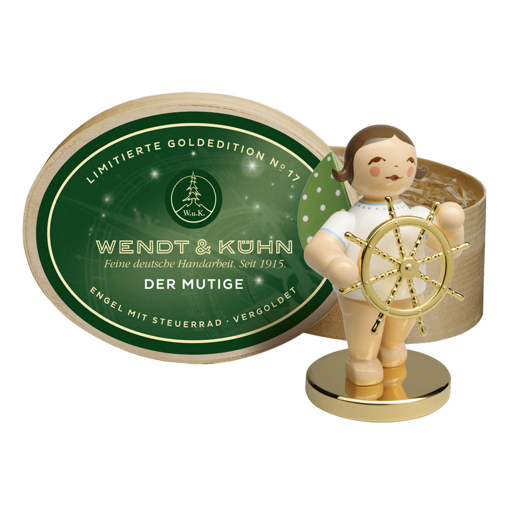 Ein Holzengel namens 'Der Mutige' mit goldenen Flügeln hält ein vergoldetes Steuerrad, steht auf einem goldfarbenen Metallsockel. Verpackt in runder Spanschachtel. im Dregeno Online Shop günstig kaufen
