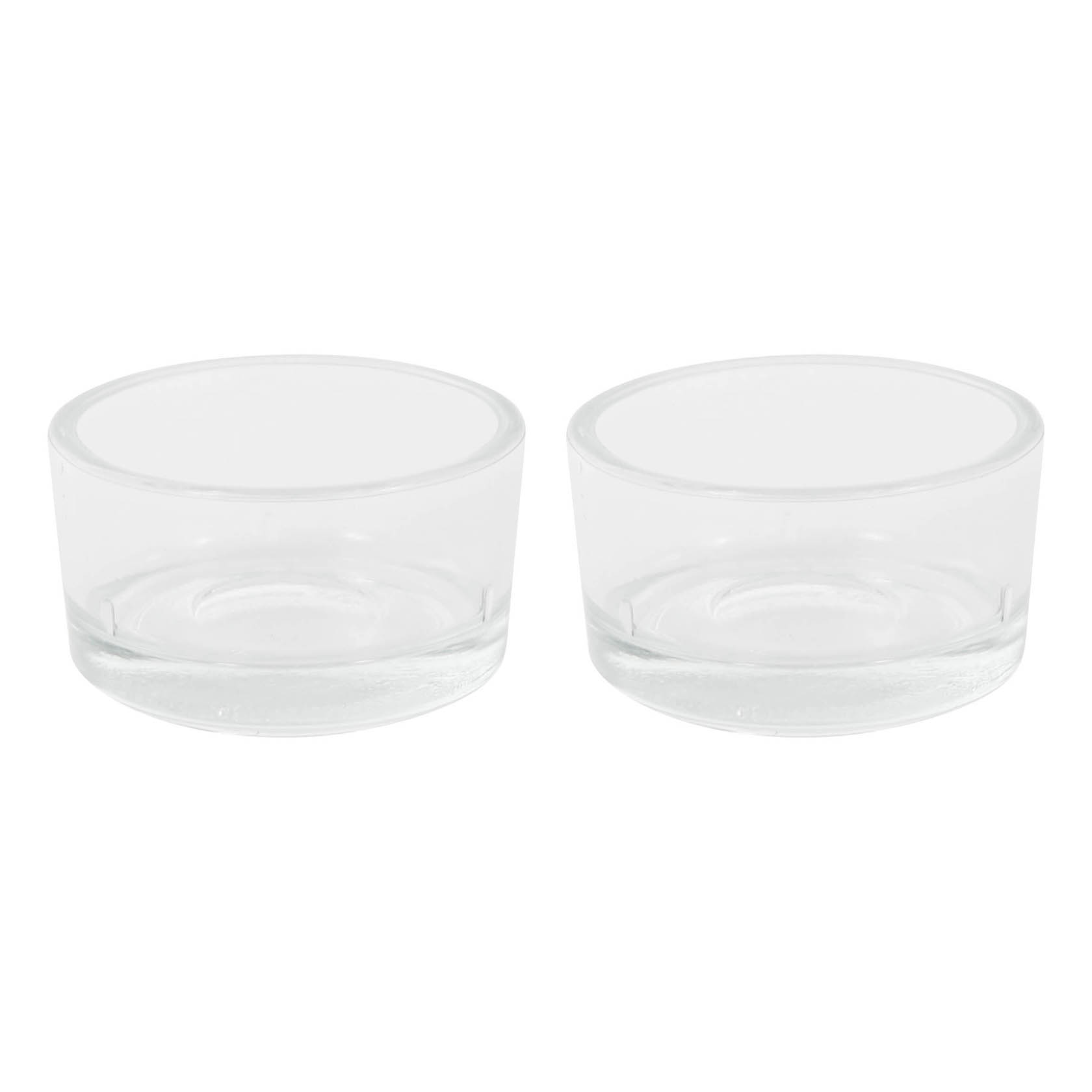 Zwei transparente Teelichtgläser, zylindrische Form, nebeneinanderstehend. im Dregeno Online Shop günstig kaufen