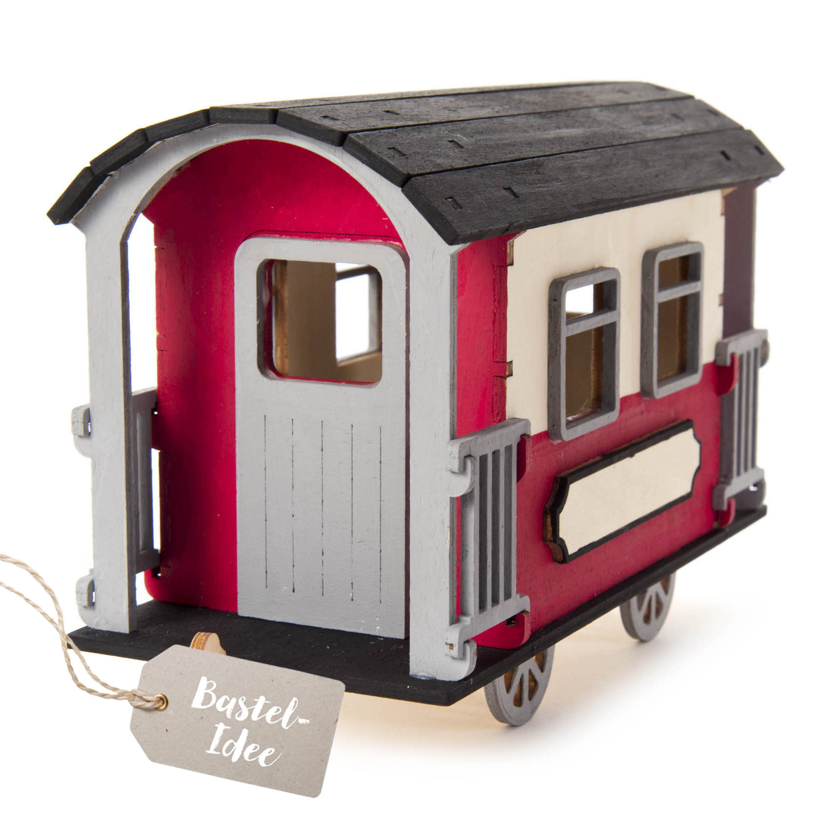 A wooden wagon model kit with a red and white body, black roof, and two wheels. The wagon features detailed railings and window cutouts. im Dregeno Online Shop günstig kaufen