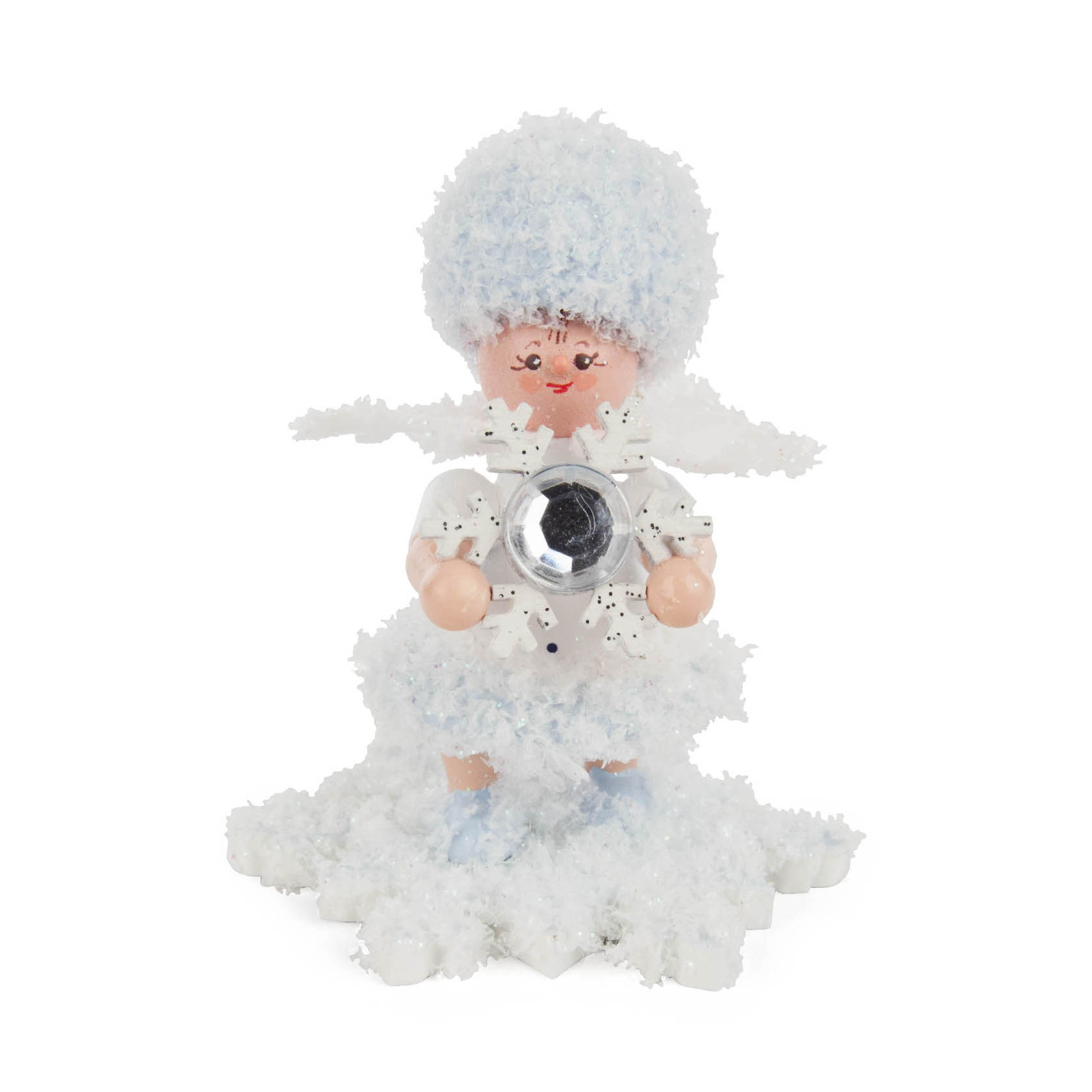 Eine Figur in Form eines Schneeflöckchens mit einem Schneekristall in der Hand, das Gesicht ist freundlich mit roten Wangen im Dregeno Online Shop günstig kaufen