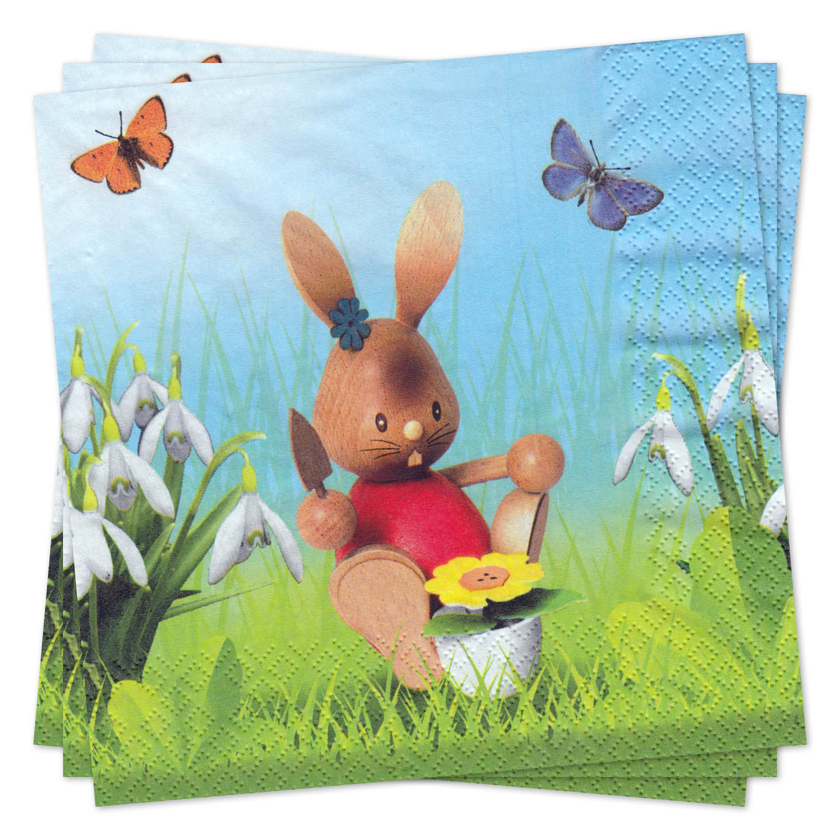 A set of napkins featuring a wooden bunny figurine called 'Gärtner Stupsi' in a garden setting with snowdrops and butterflies. im Dregeno Online Shop günstig kaufen