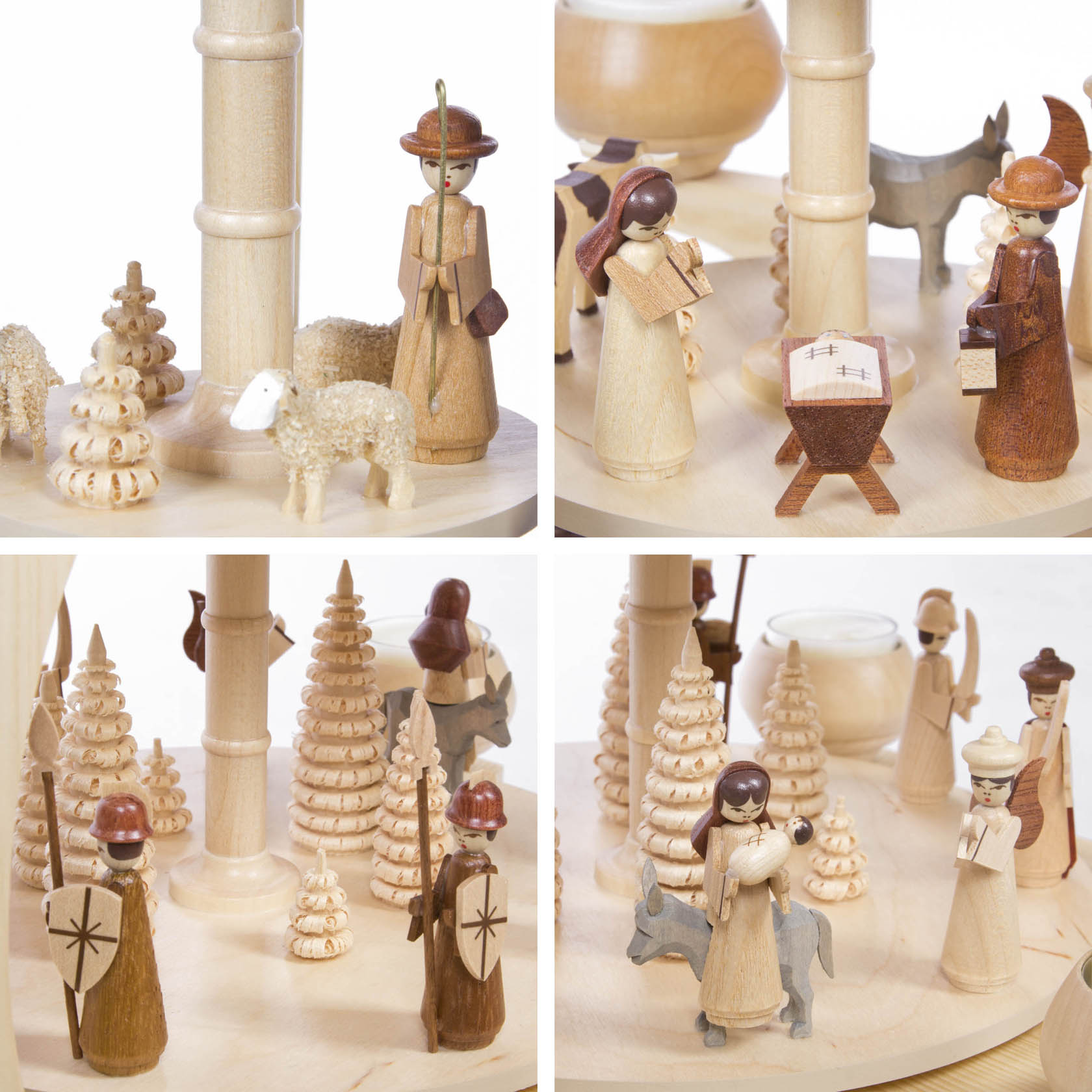 Eine vierstöckige Weihnachtspyramide aus Holz mit Szenen der Geburt Christi. Figuren wie Maria, Josef, das Jesuskind in der Krippe, Hirten und Schafe sind zu sehen.