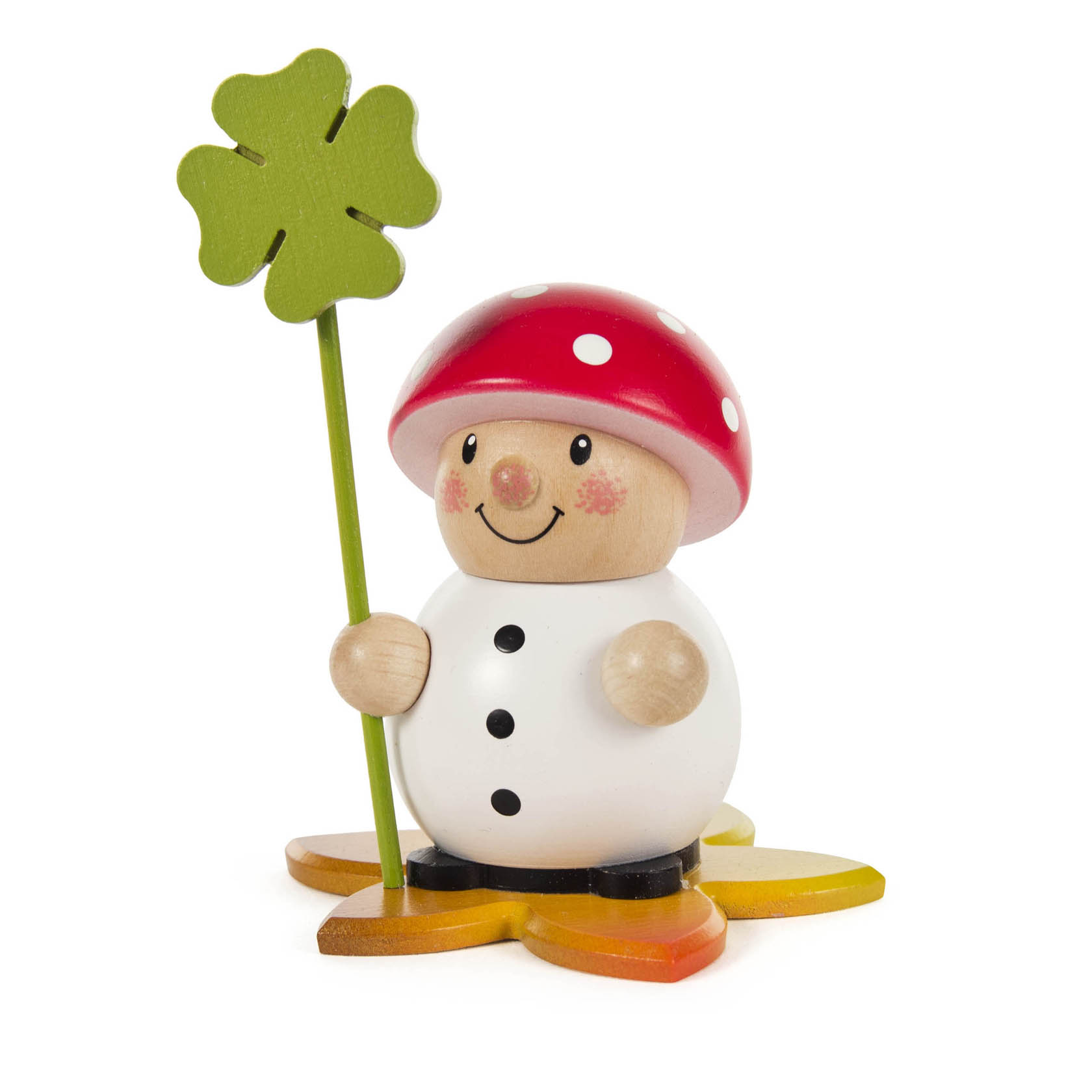 Holzfigur eines lächelnden Glückspilzes mit rotem Hut und weißen Punkten, hält ein grünes Kleeblatt. Steht auf einem sternförmigen Sockel. im Dregeno Online Shop günstig kaufen